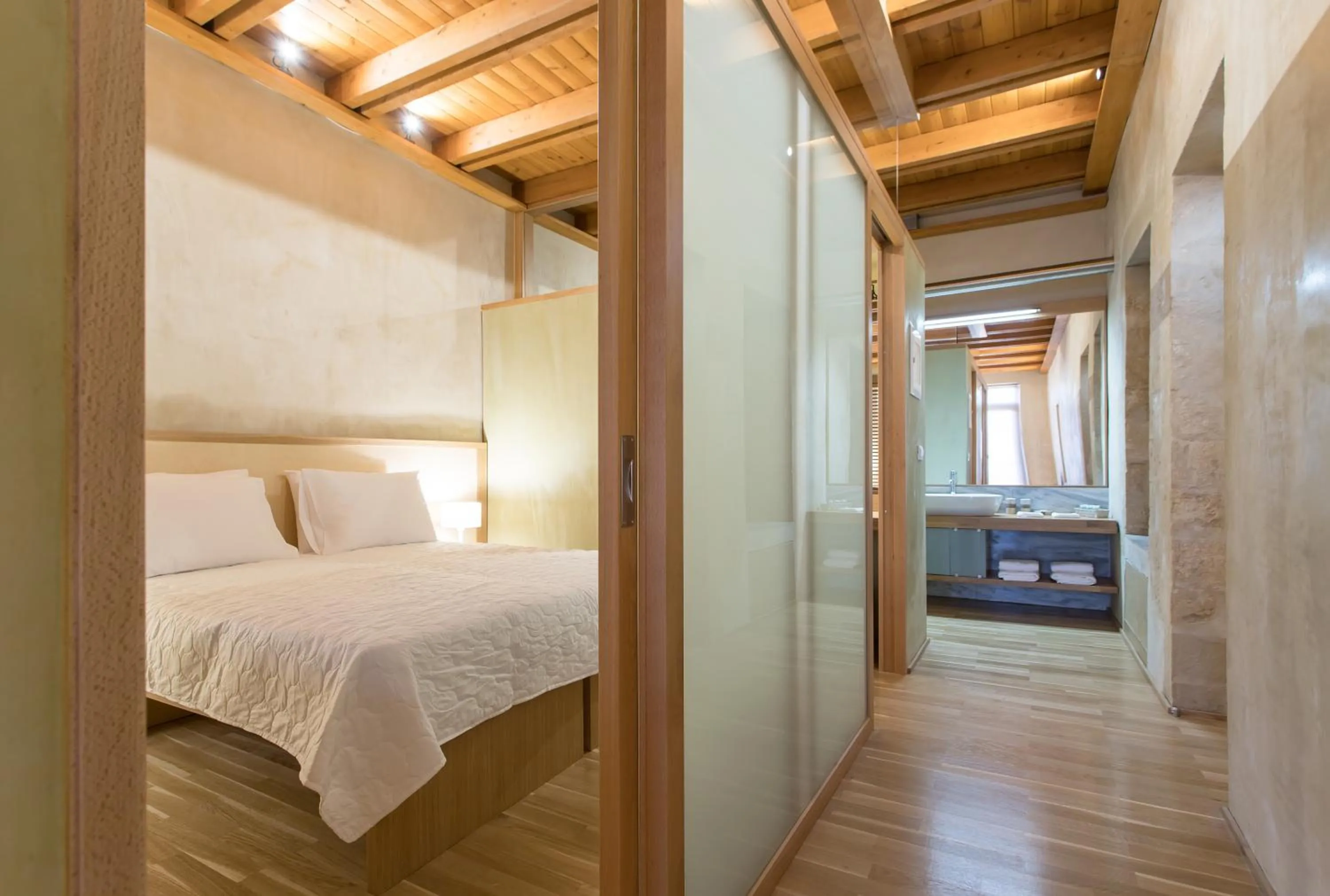 Bed in Polixeny's Suites