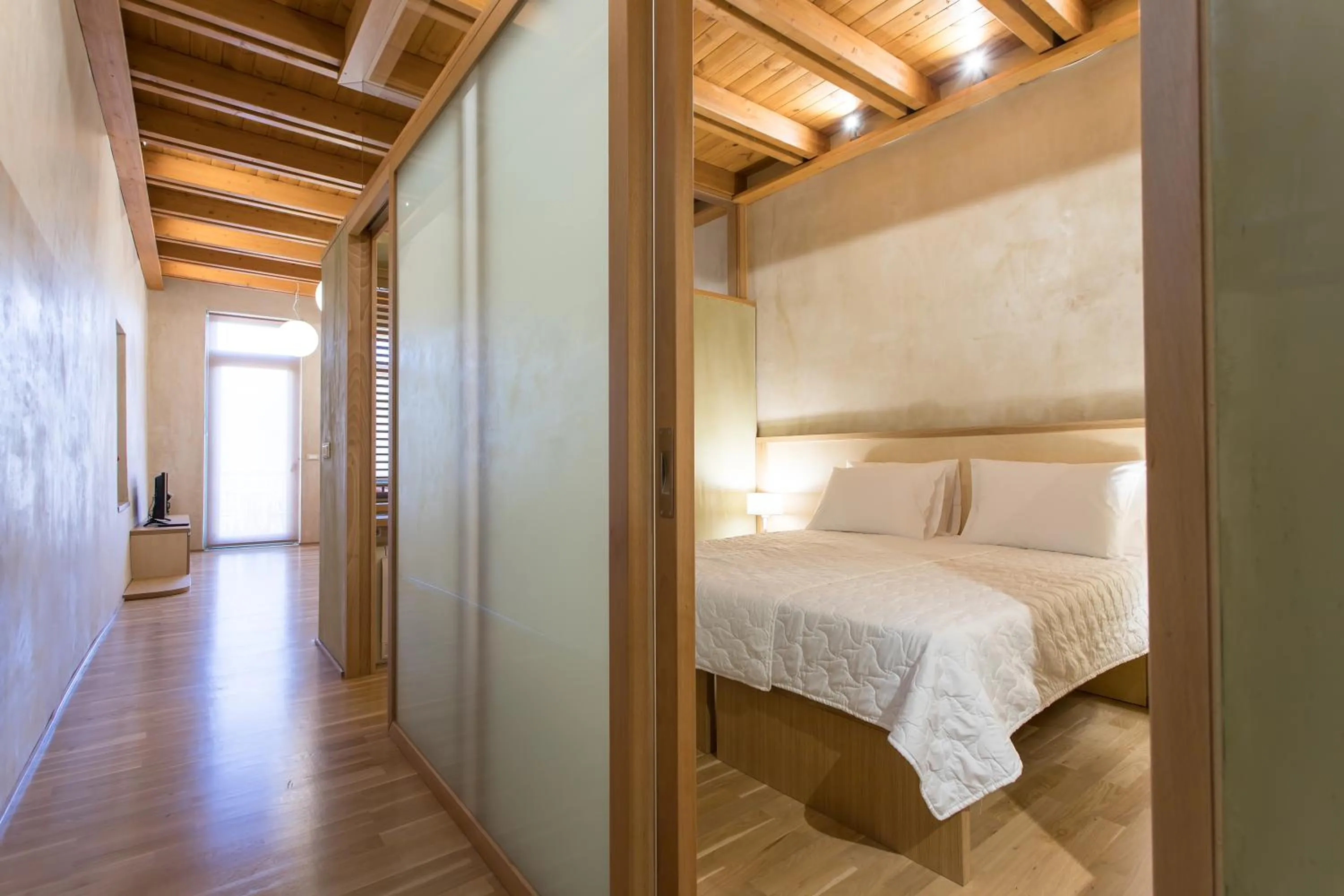 Bed in Polixeny's Suites