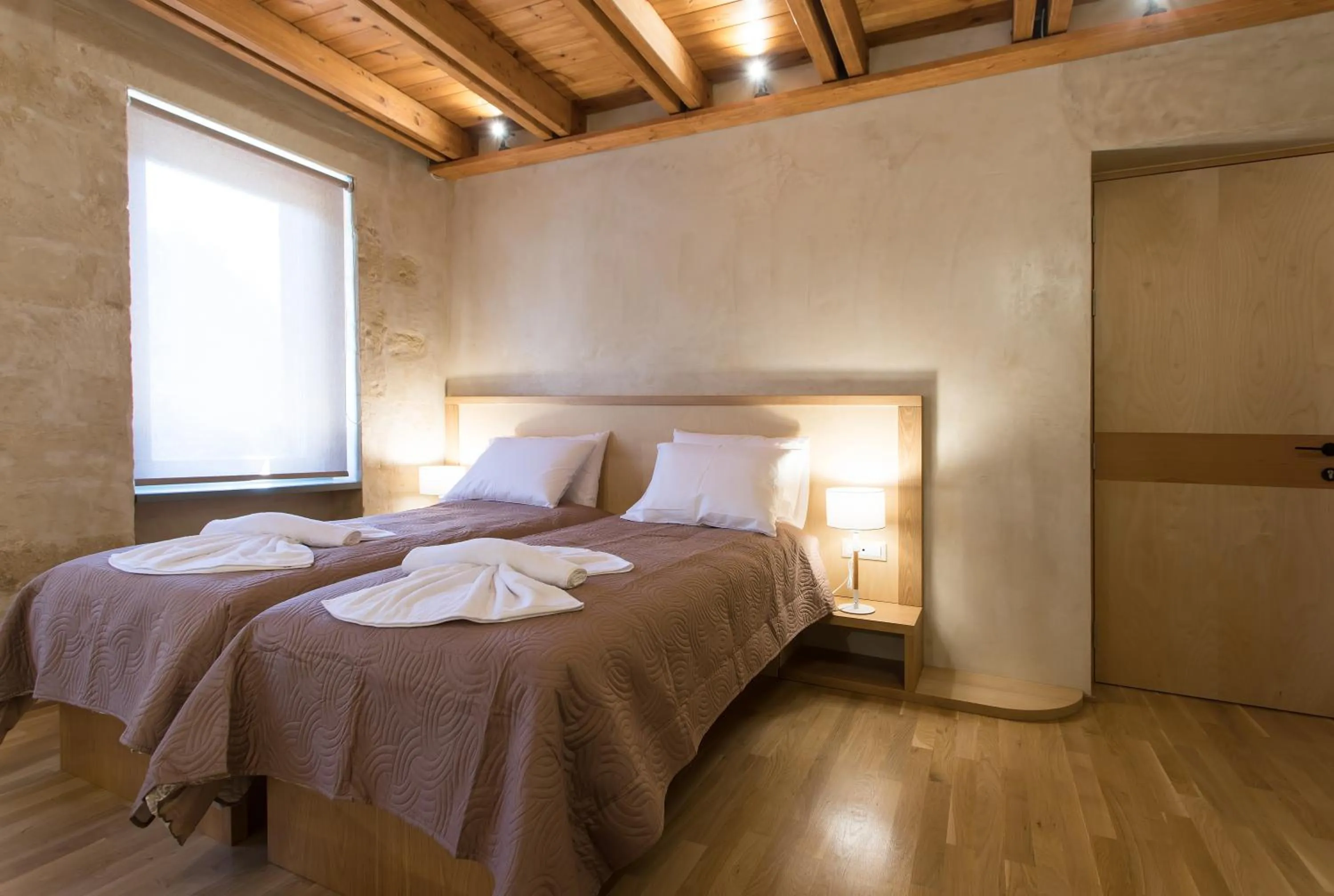 Bed in Polixeny's Suites