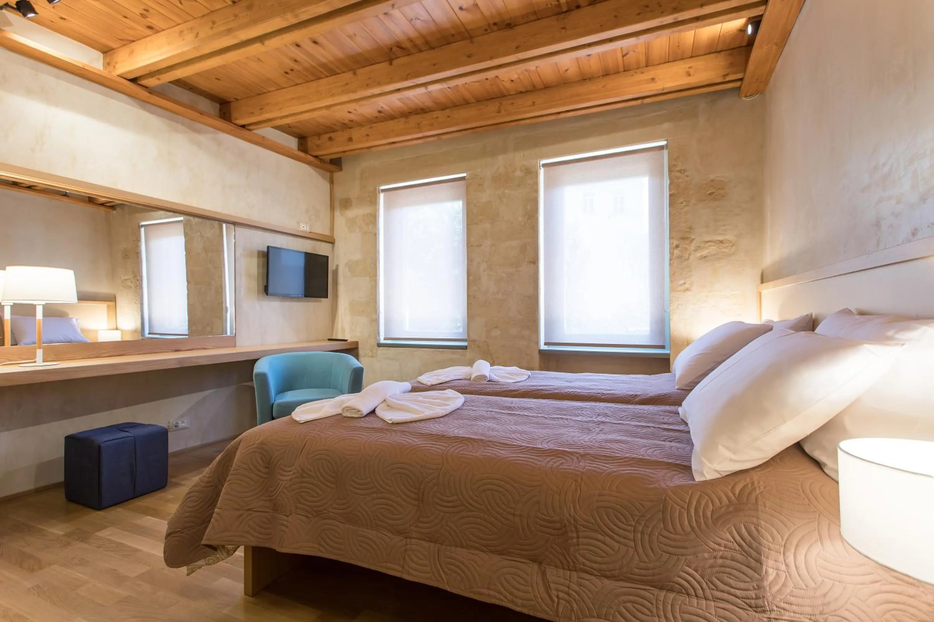 Bed in Polixeny's Suites