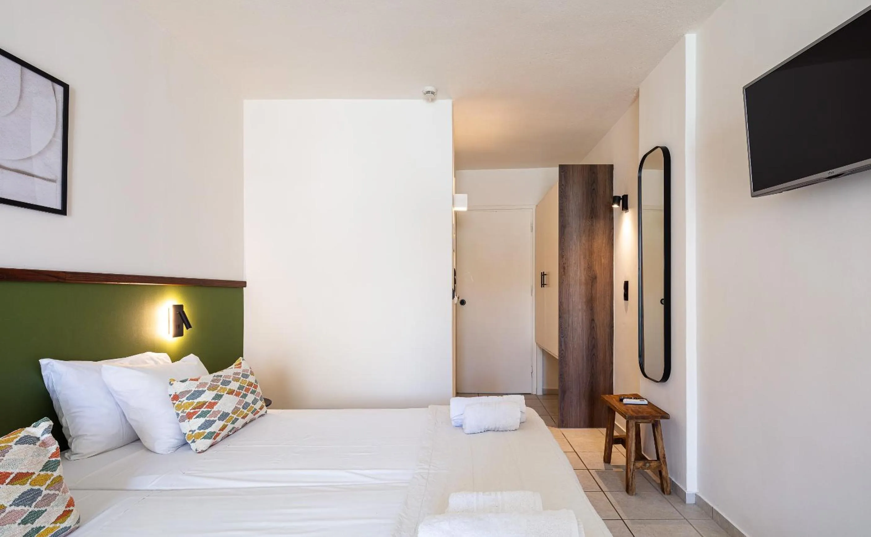 Bed in Aristea Hotel