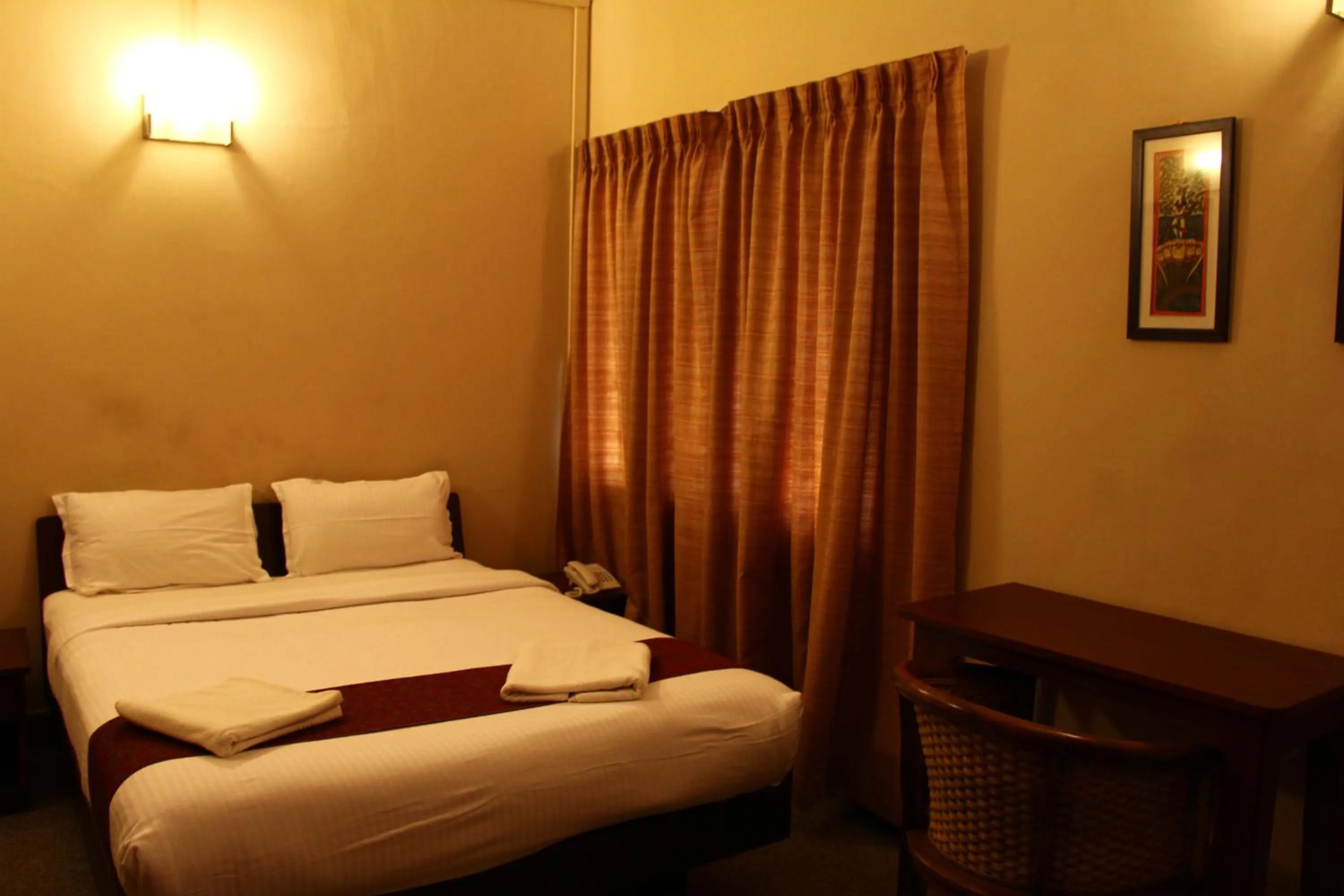 Bed in Hanu Reddy Residences Wallace Garden