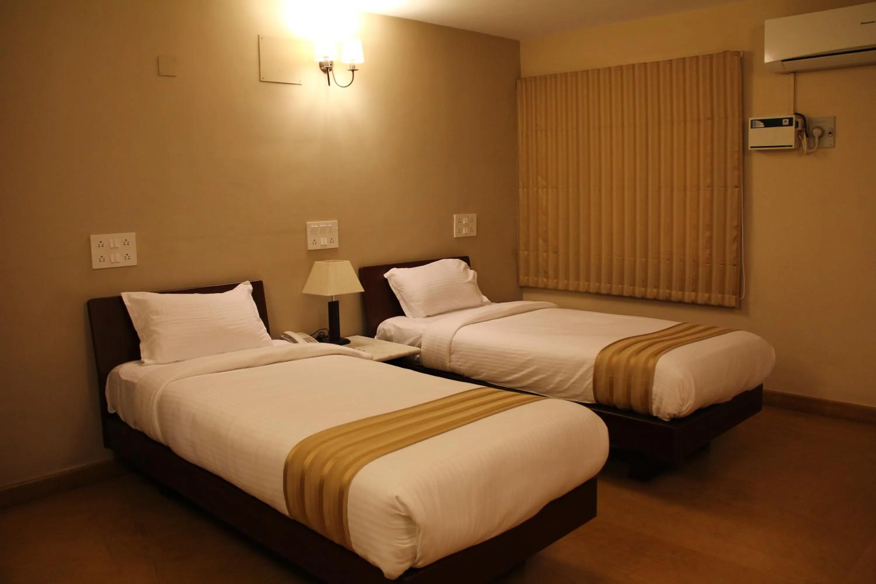 Bed in Hanu Reddy Residences Wallace Garden