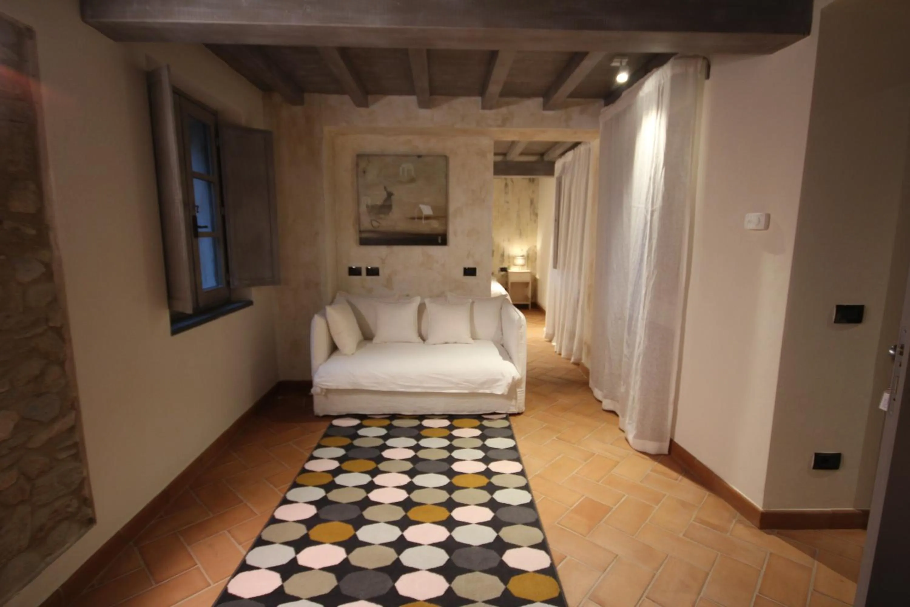 Living room, Bed in Dimora Carducci