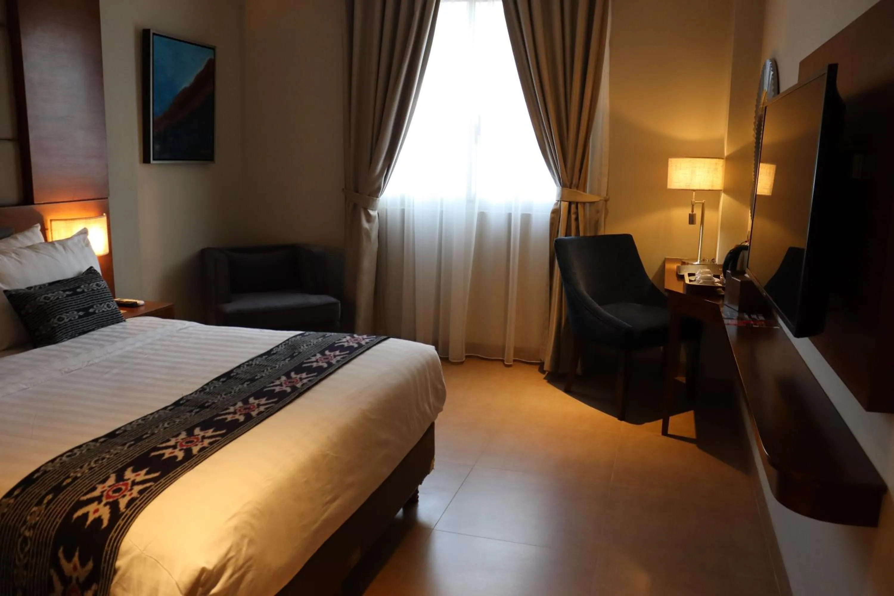 Photo of the whole room, Bed in SOTIS Hotel Kemang, Jakarta