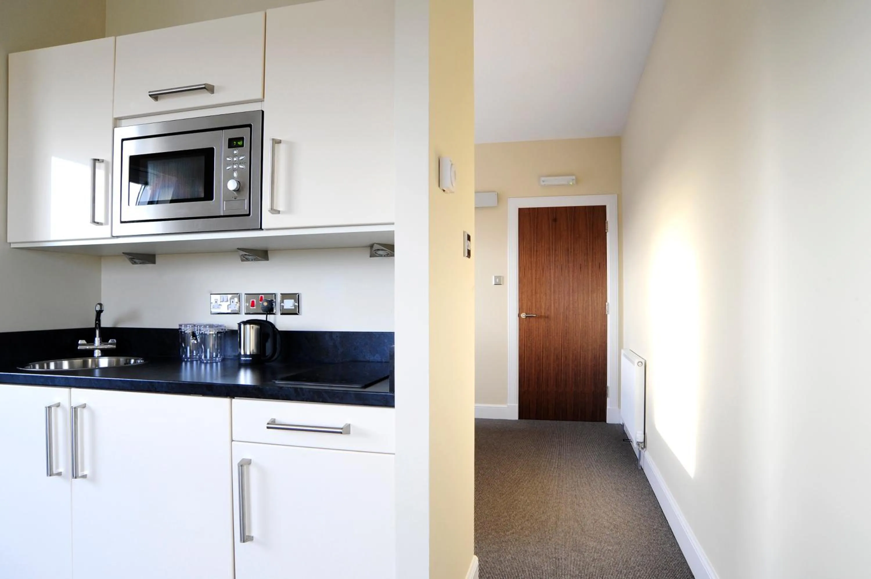 Kitchen or kitchenette in The Craibstone Suites