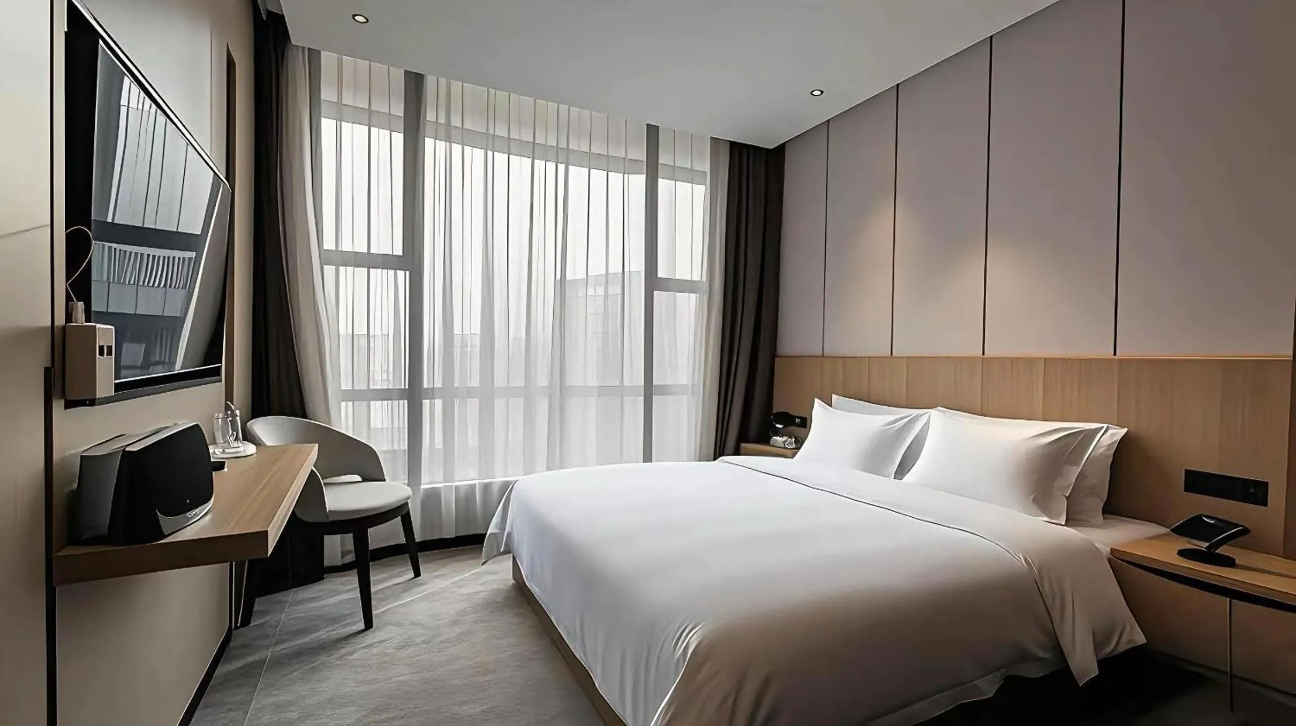 Photo of the whole room, Bed in Paco Hotel Guangzhou Baiyun Airport Liantang Metro