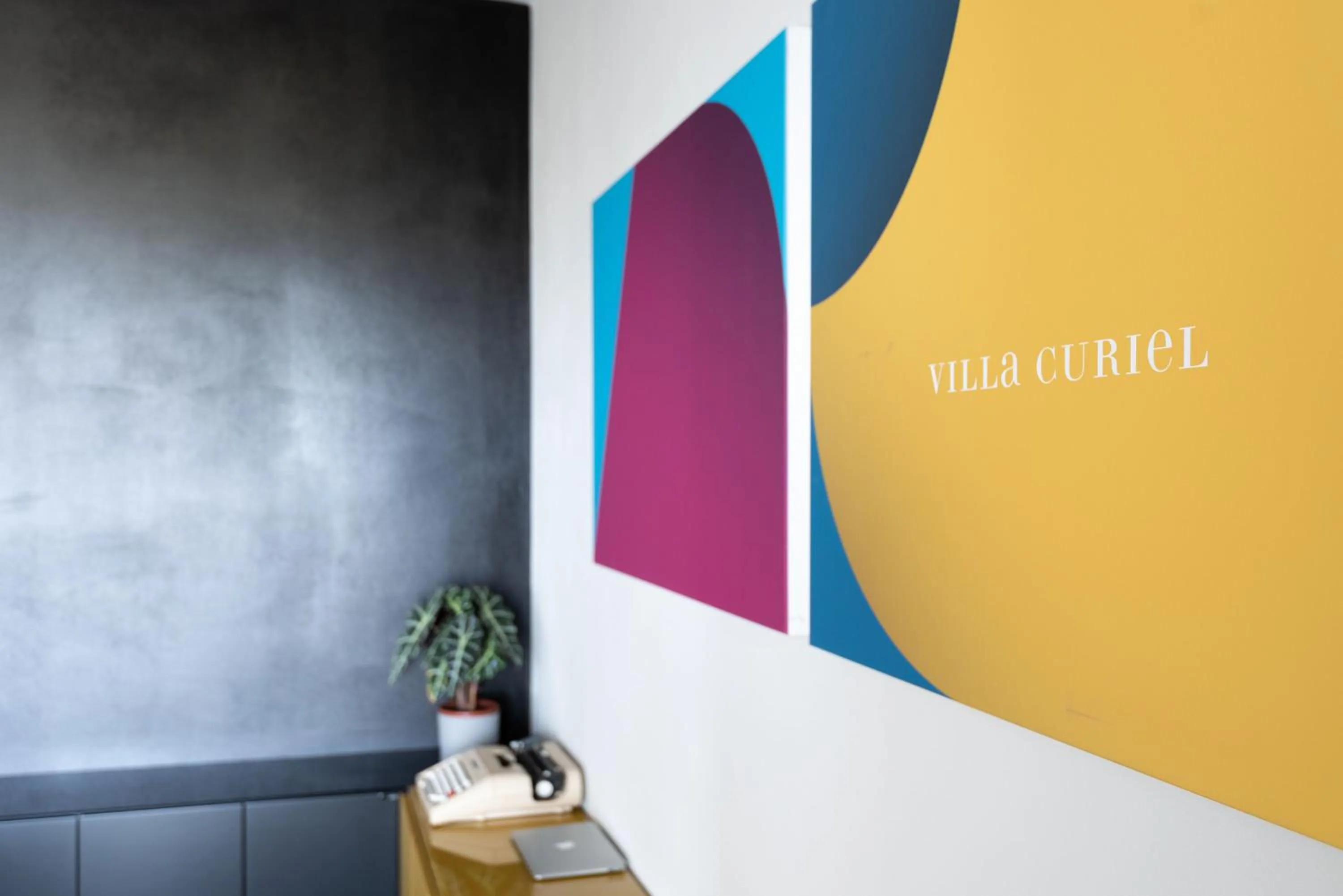 Property logo or sign in Villa Curiel