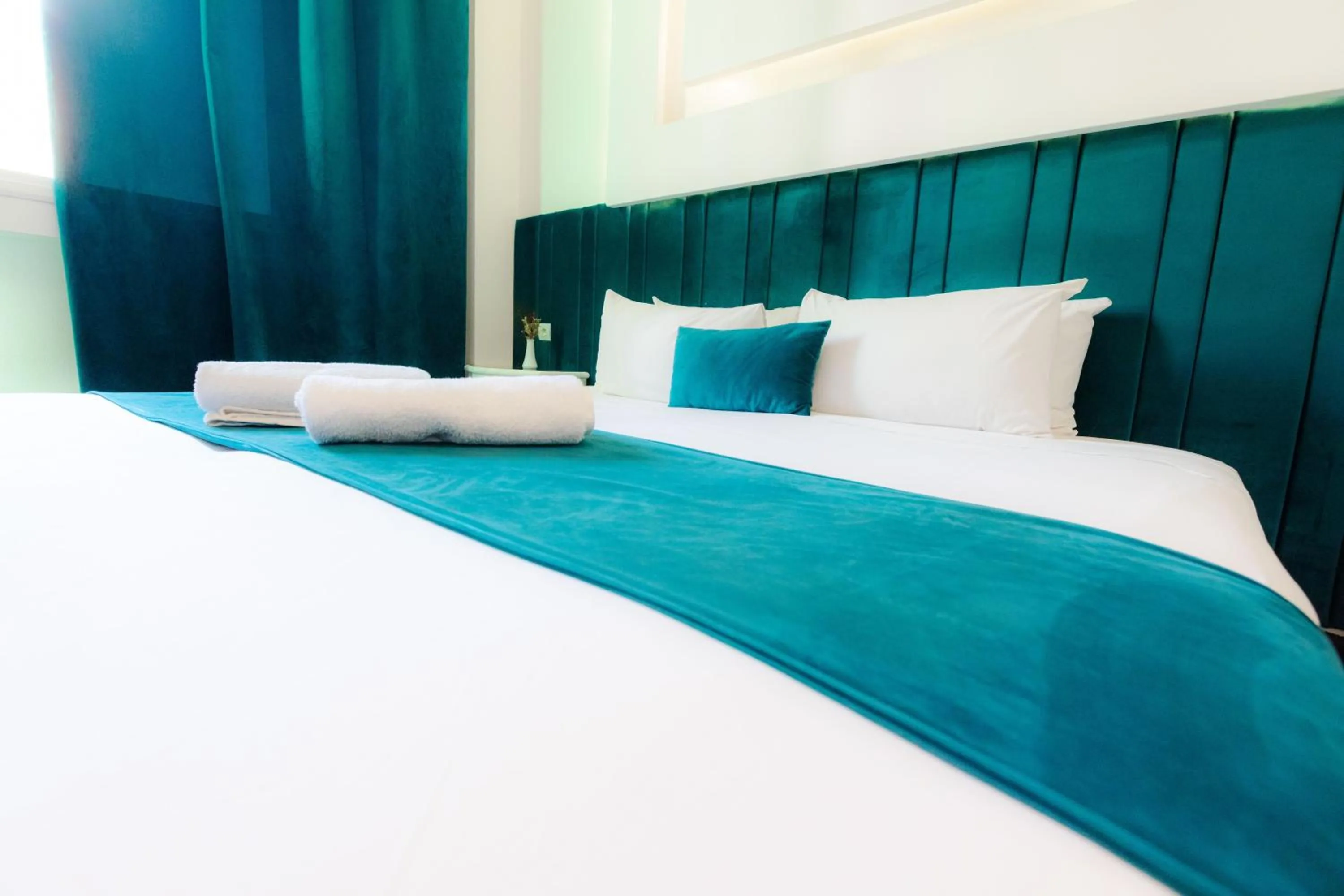 Bed in WINDSOR HOTEL CITY CENTER