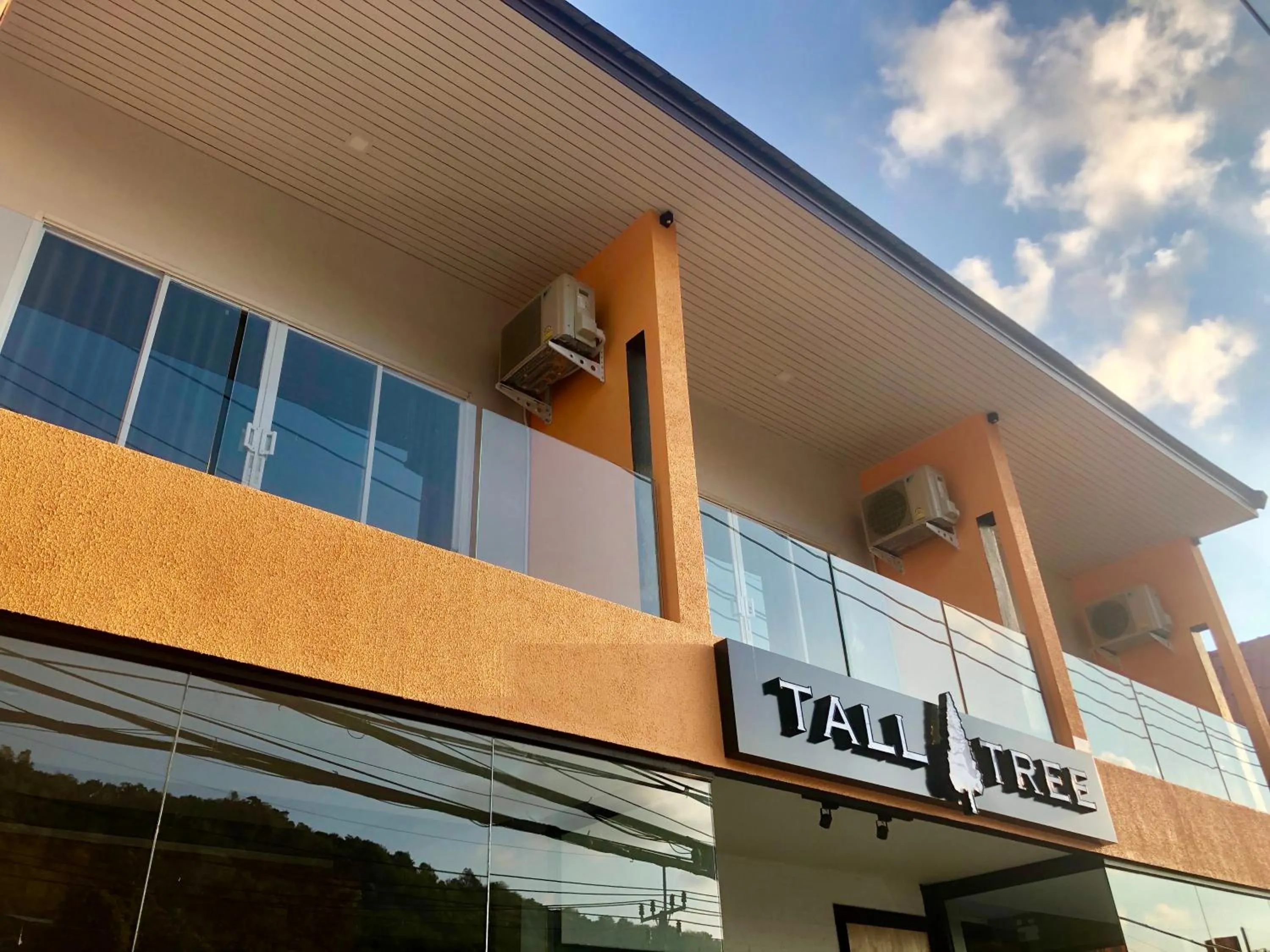 Property logo or sign in Tall Tree Kata Phuket