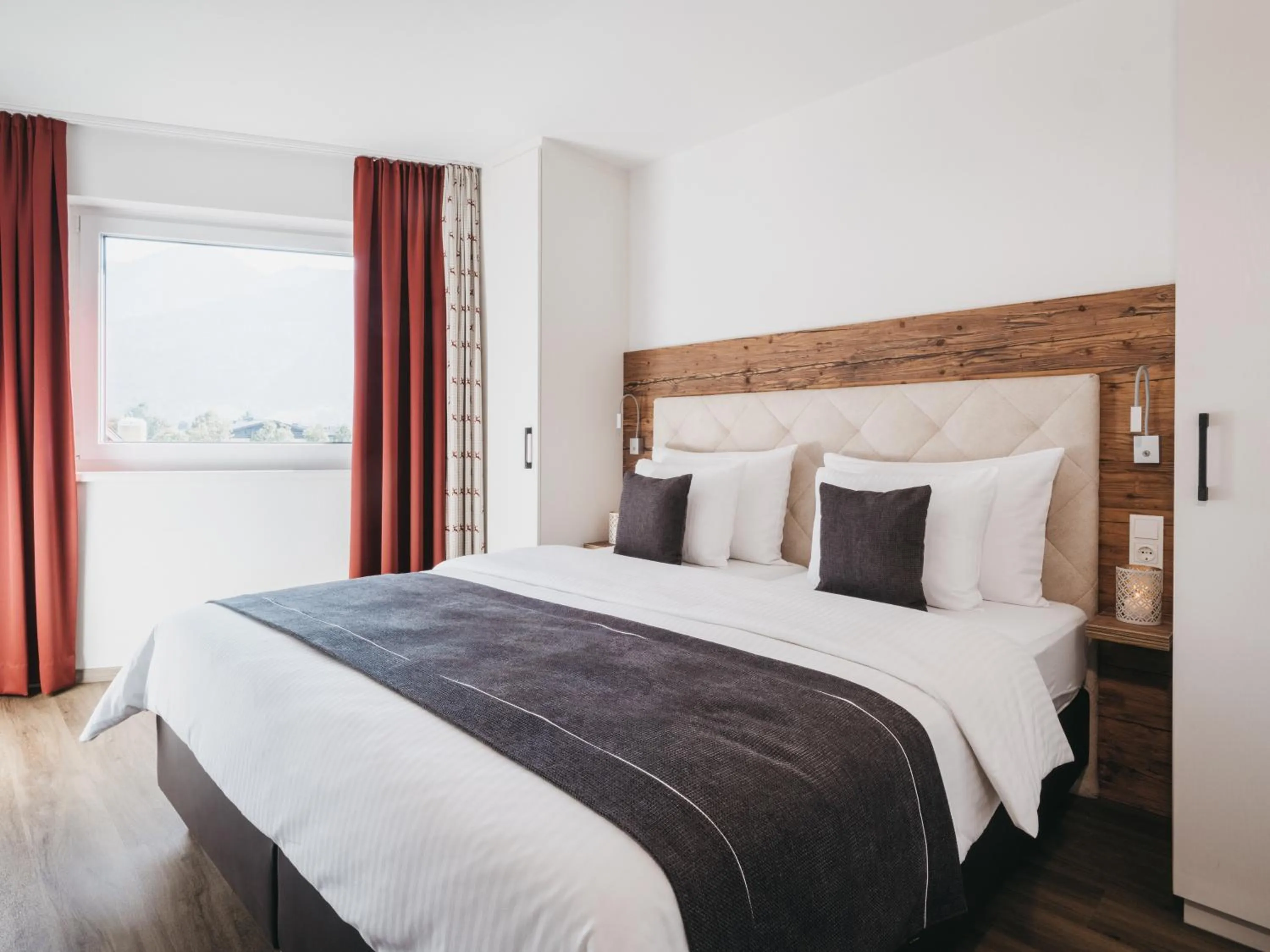 Living room, Bed in Village Park Suites
