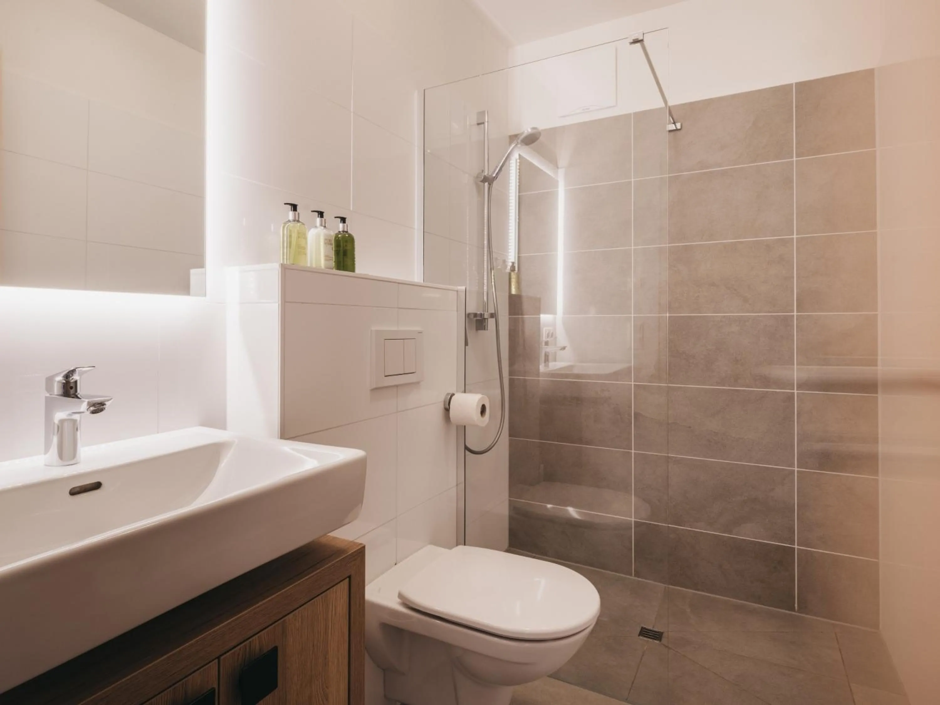 Bathroom in Village Park Suites