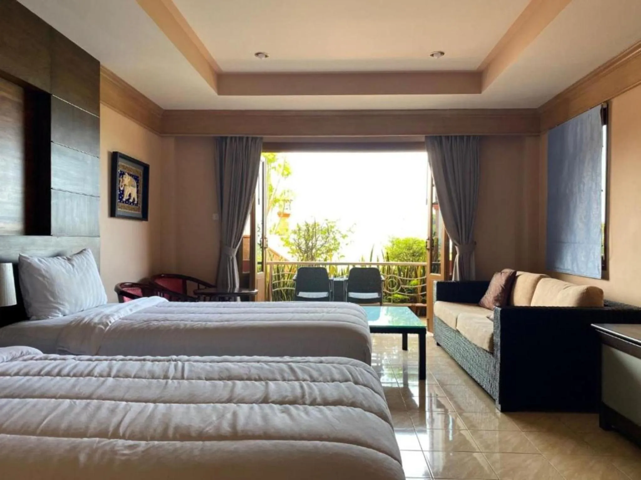 Bed in Baan Kongdee Sunset Resort Kata