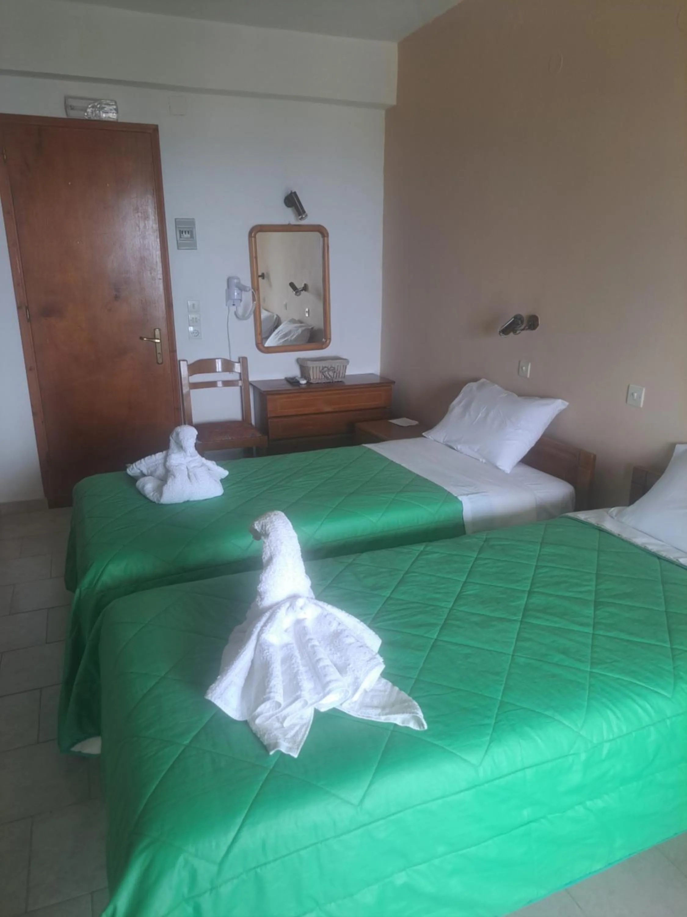 Bed in Marinos Studios at Lourdata village