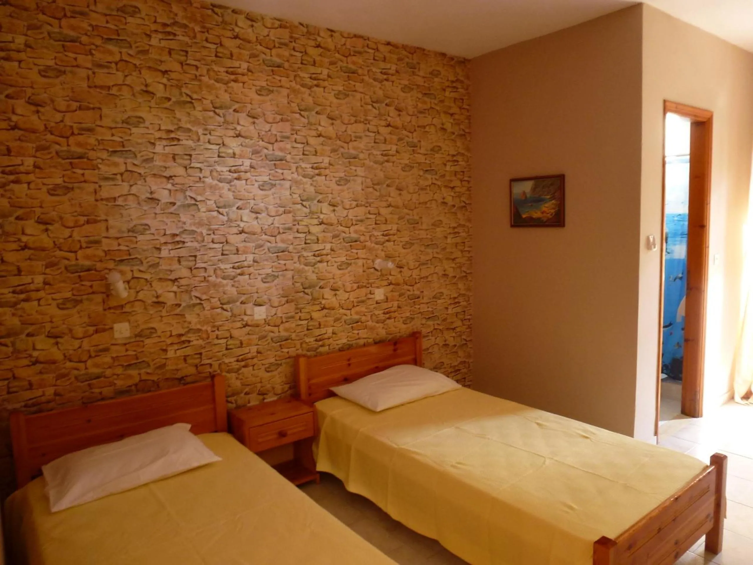 Bed in Marinos Studios at Lourdata village