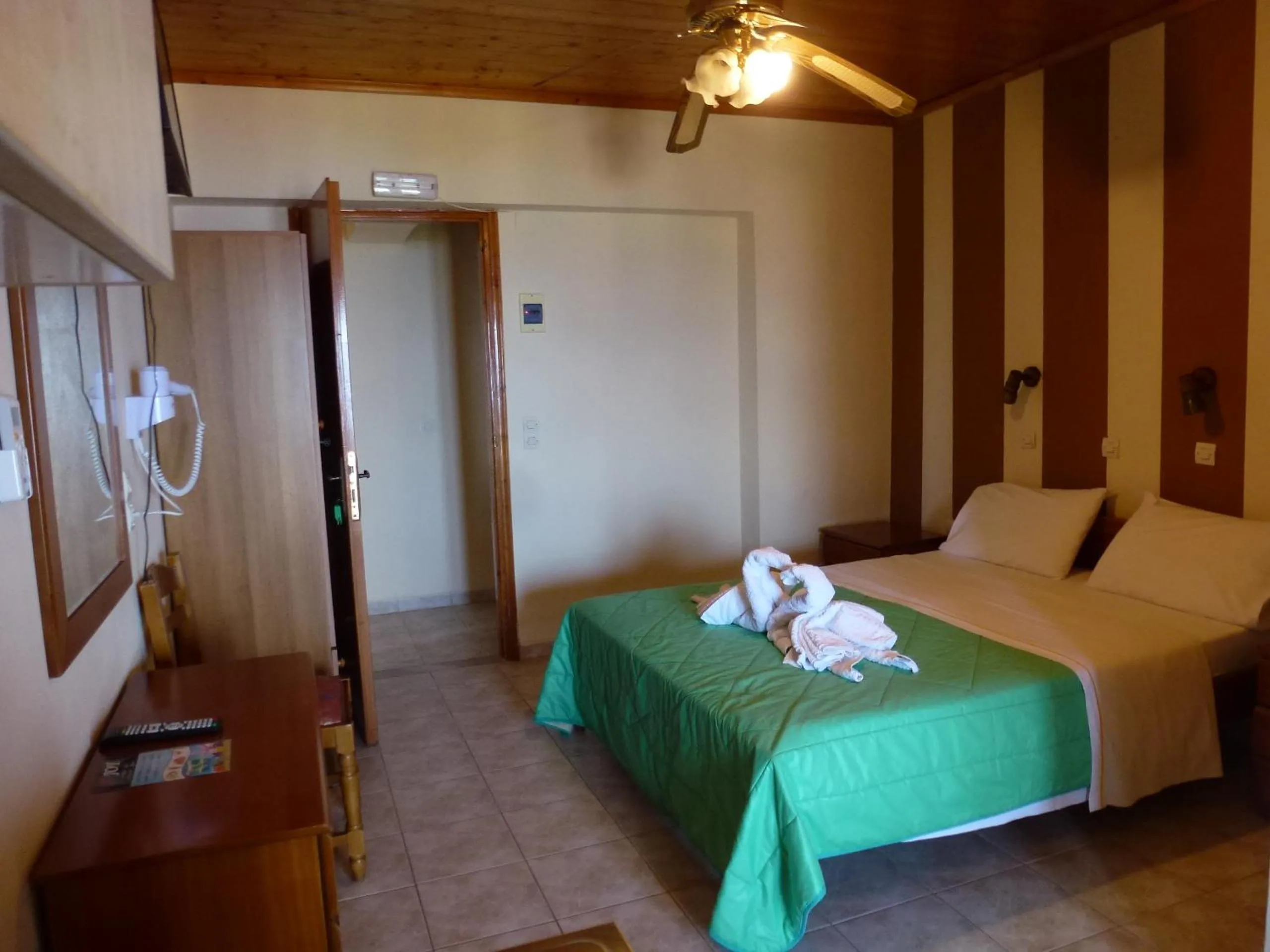 Bed in Marinos Studios at Lourdata village
