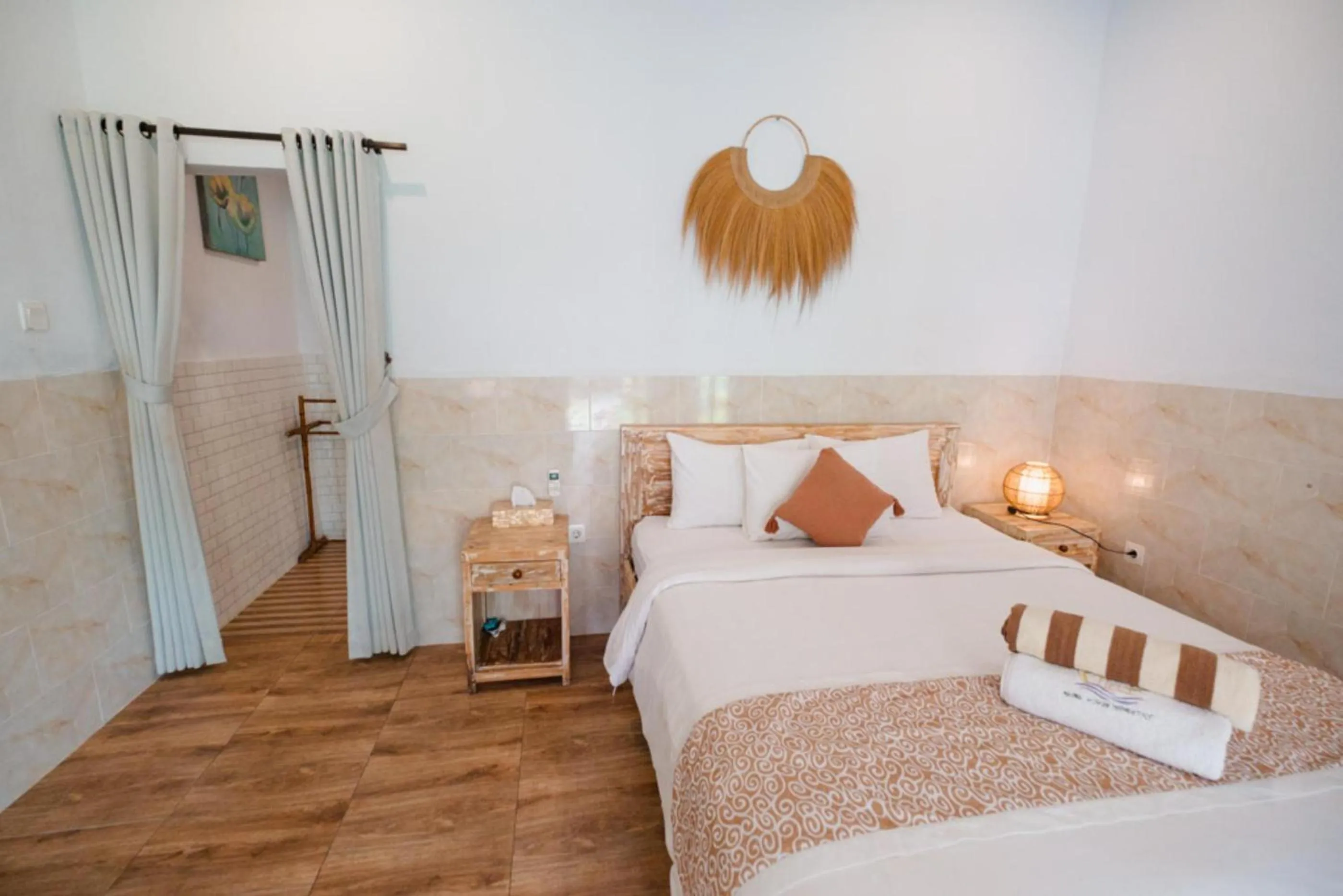 Bed in Agung Wiwin Homestay & Restaurant