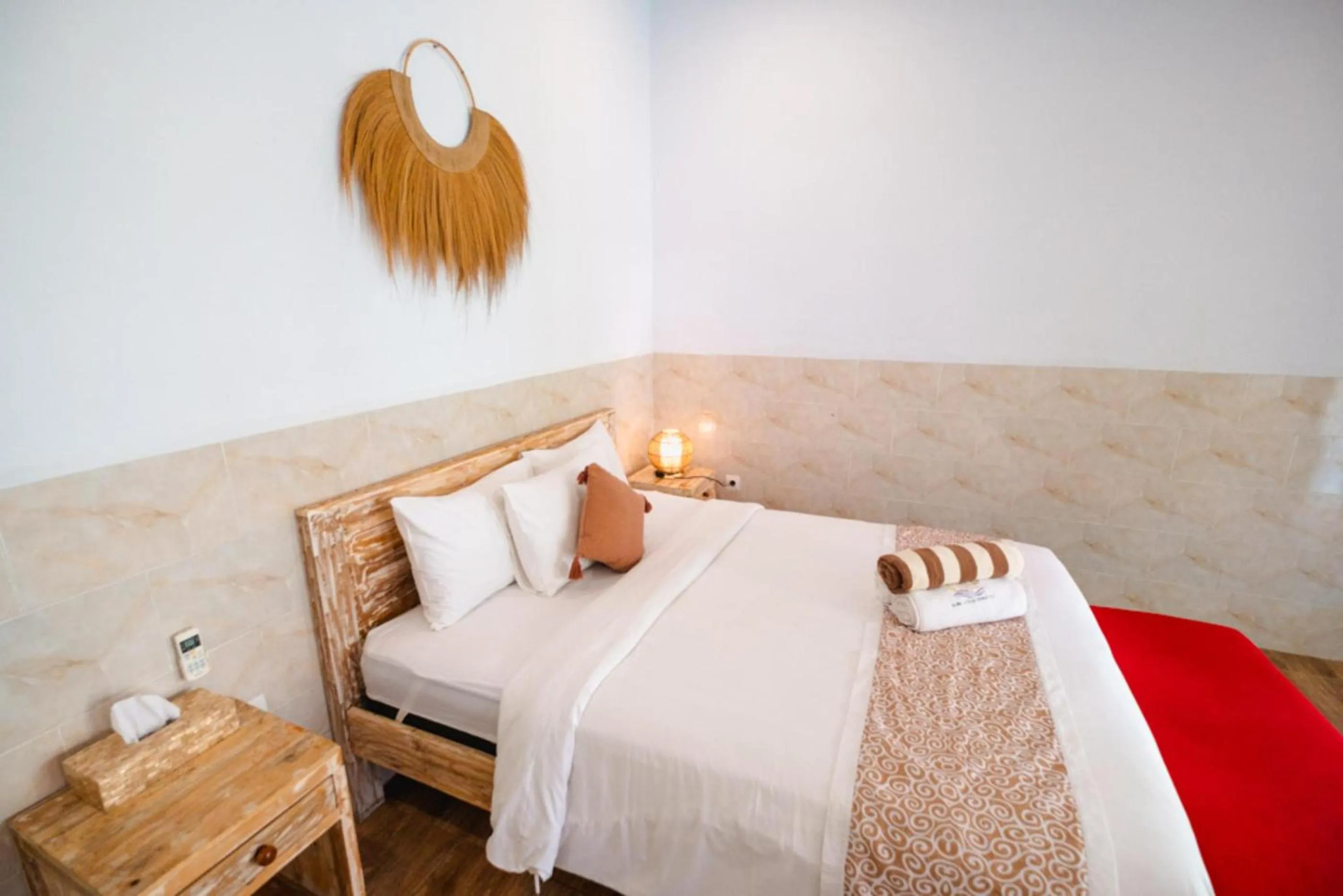 Bed in Agung Wiwin Homestay & Restaurant