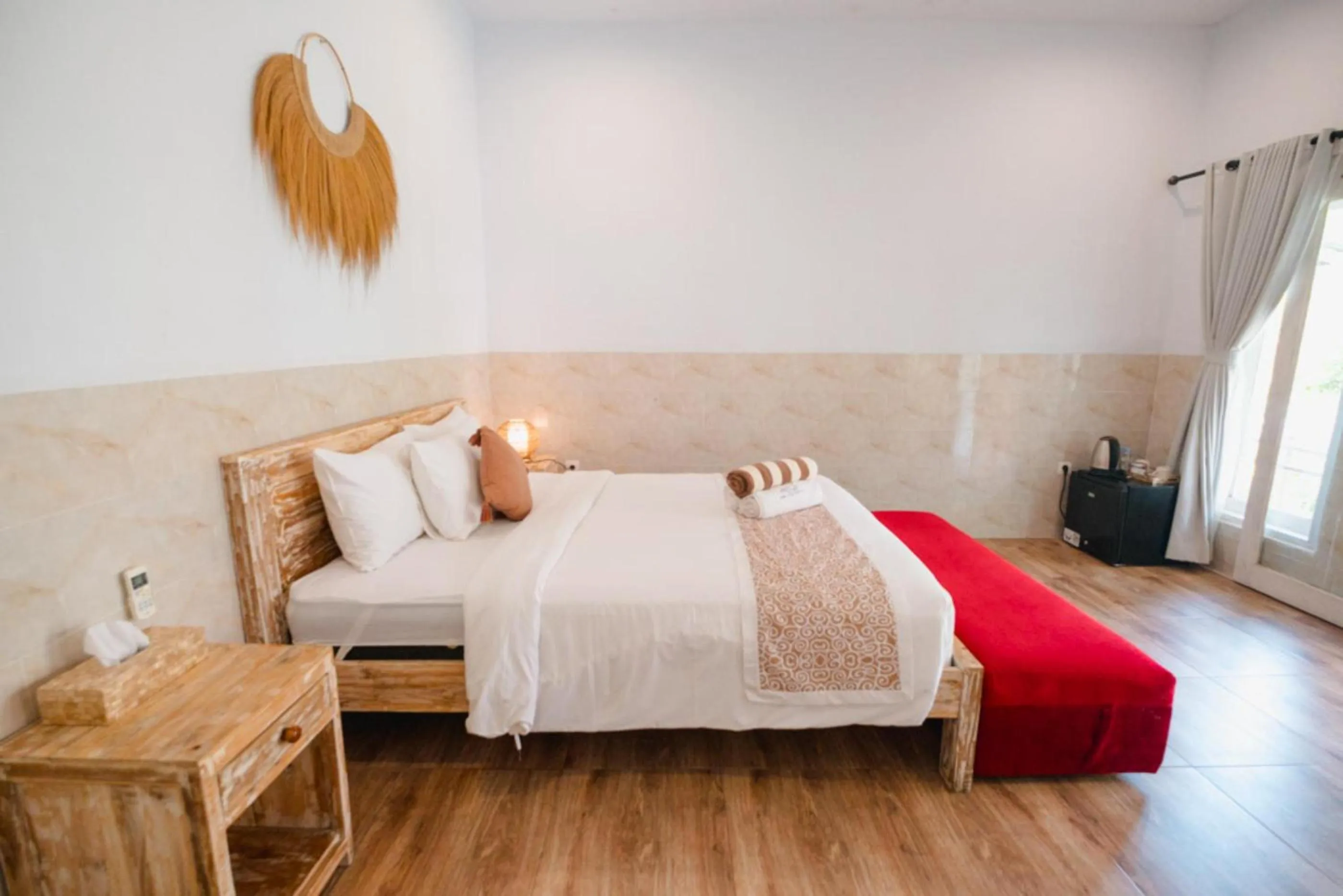 Bed in Agung Wiwin Homestay & Restaurant