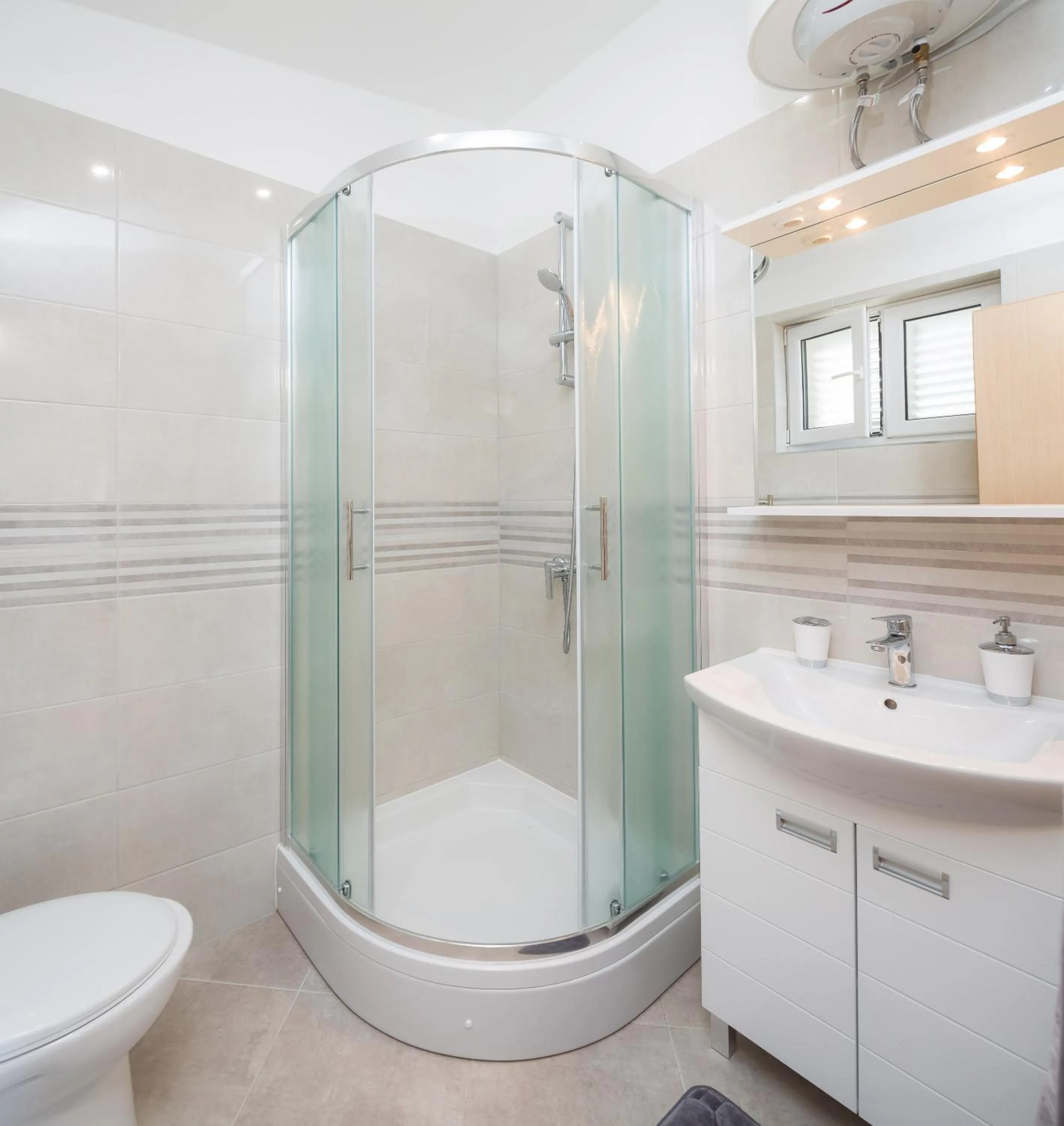 Shower in FBA Family Beach Apartments