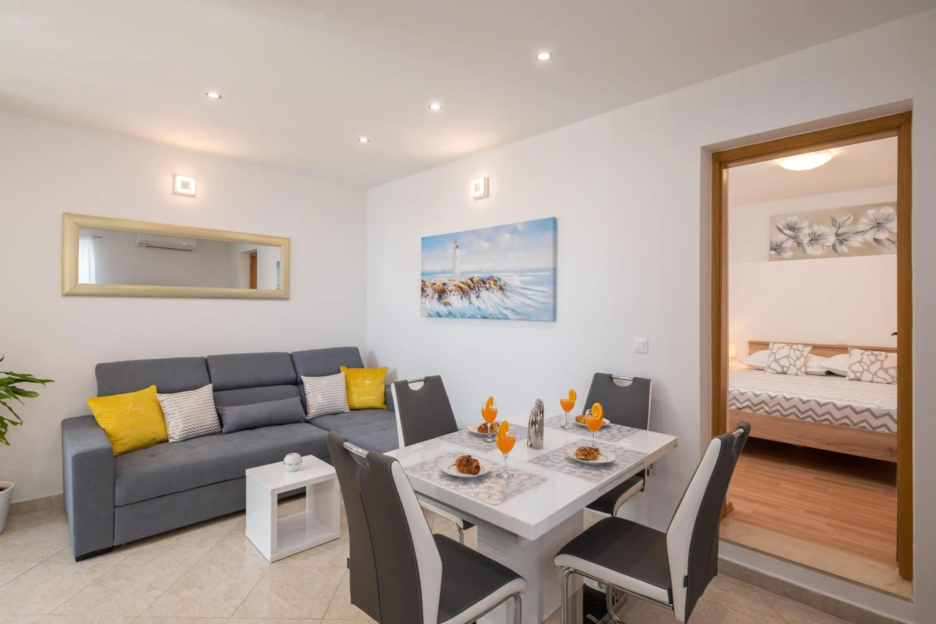 Living room, Bed in FBA Family Beach Apartments