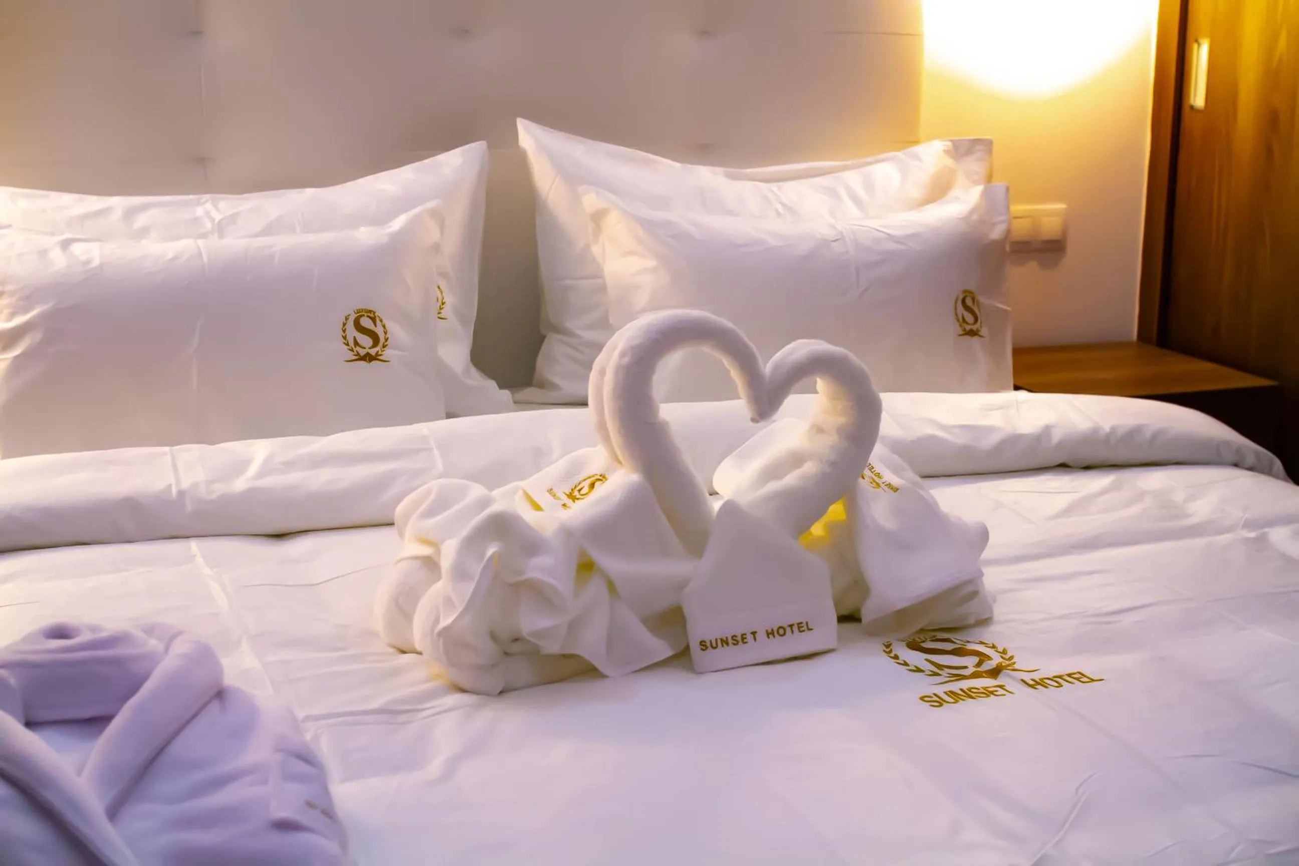 Bed in SUNSET HOTEL