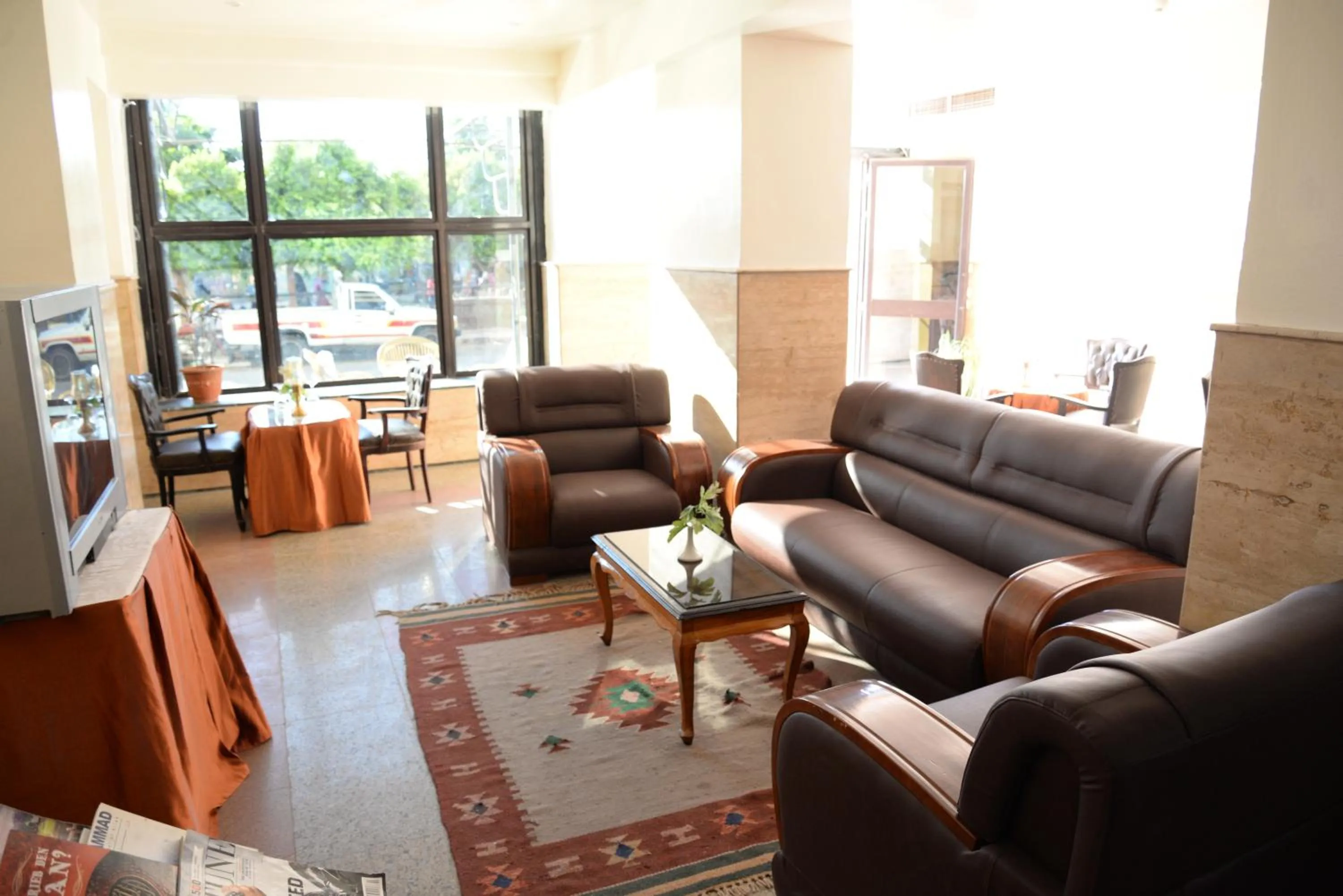 Communal lounge/ TV room in Marhaba Palace Hotel