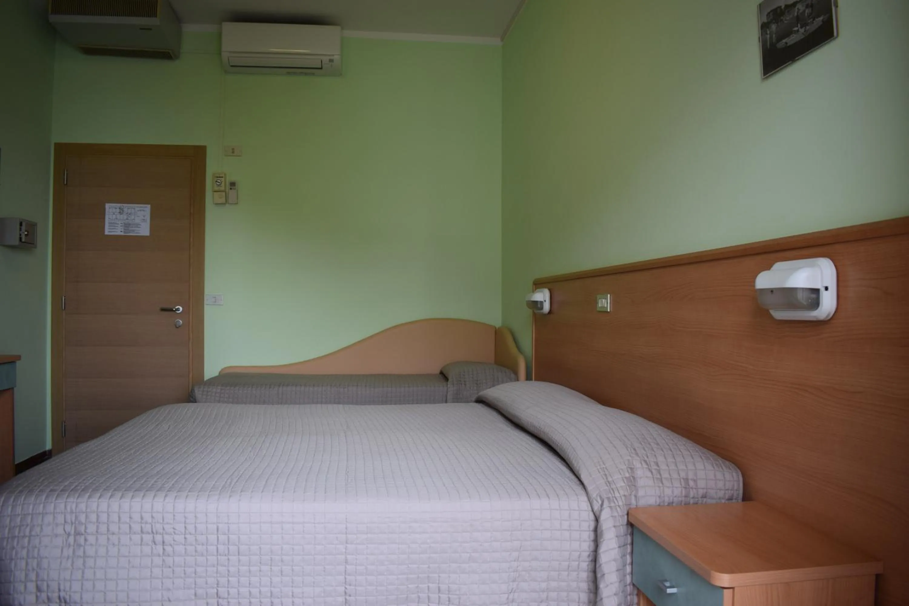 Bed in Hotel Martinez