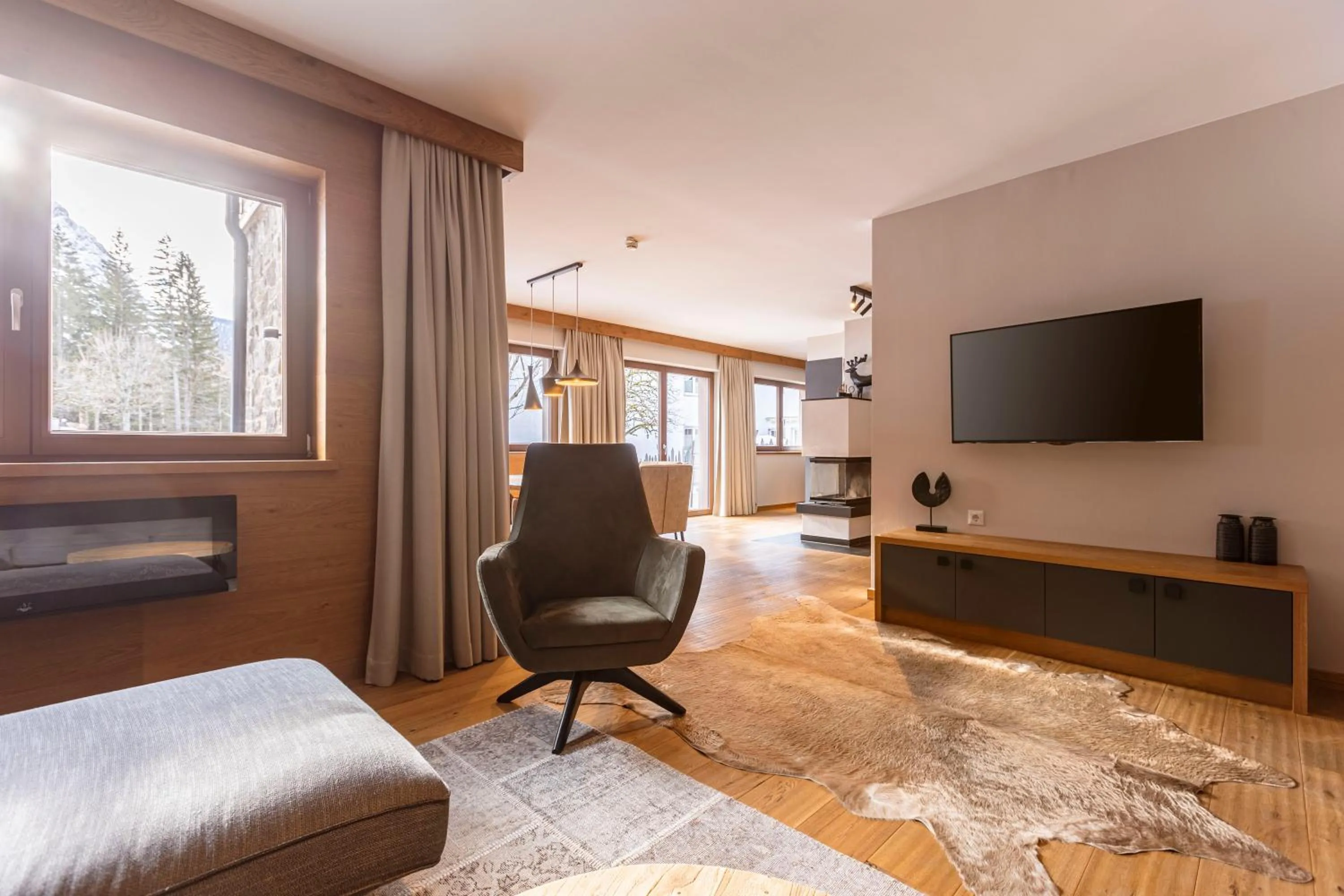 Living room in Bergresort Zugspitze Ehrwald by ALPS RESORTS