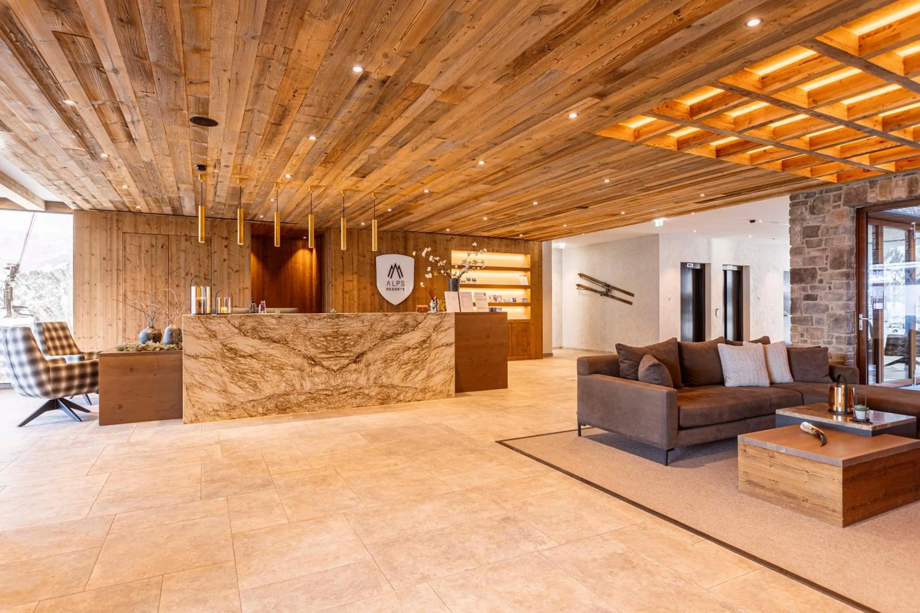 Lobby or reception in Bergresort Zugspitze Ehrwald by ALPS RESORTS