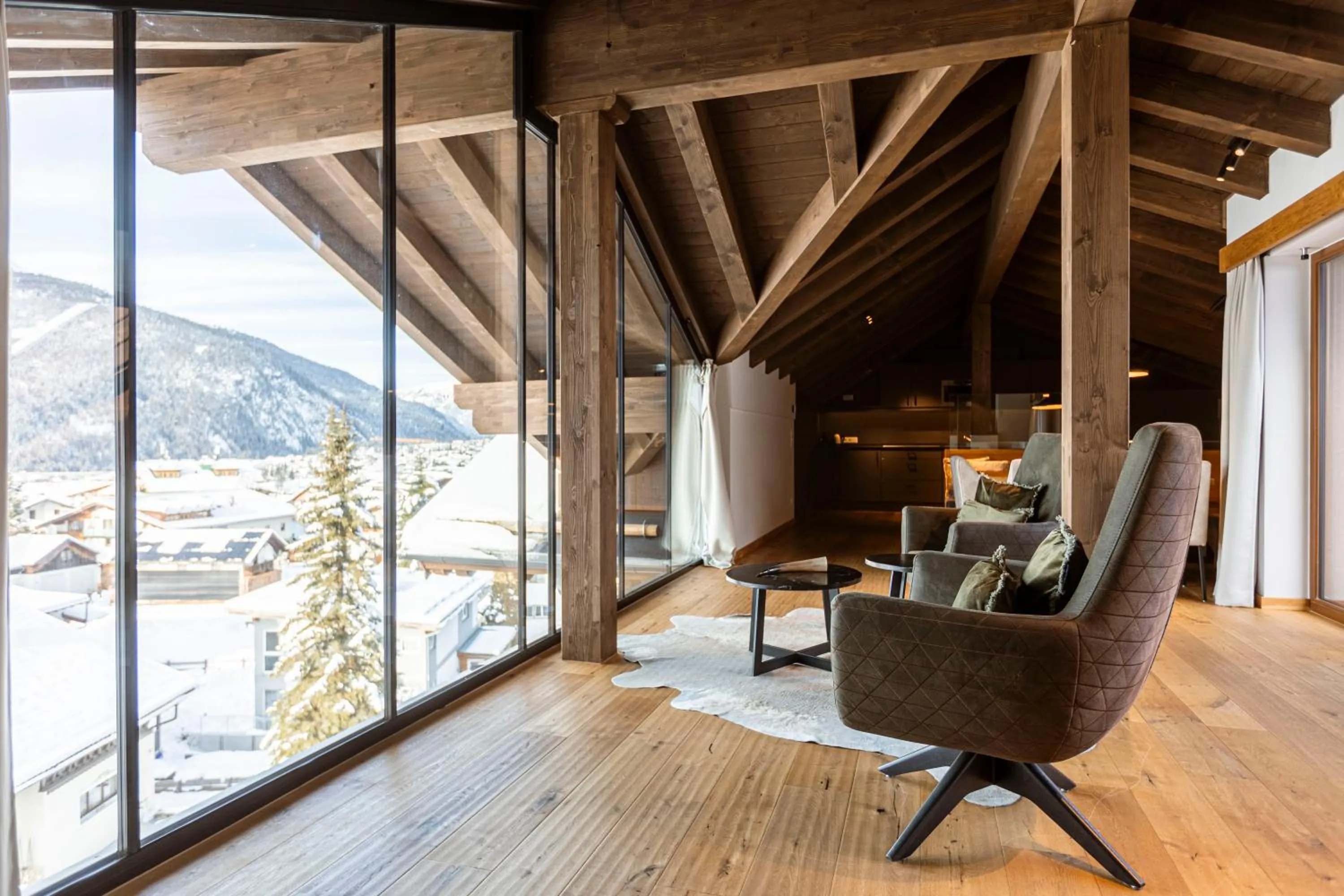 Living room in Bergresort Zugspitze Ehrwald by ALPS RESORTS