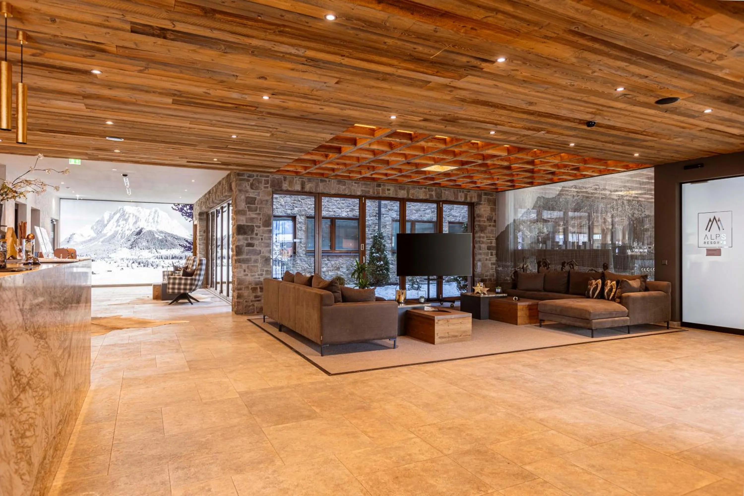 Lobby or reception in Bergresort Zugspitze Ehrwald by ALPS RESORTS