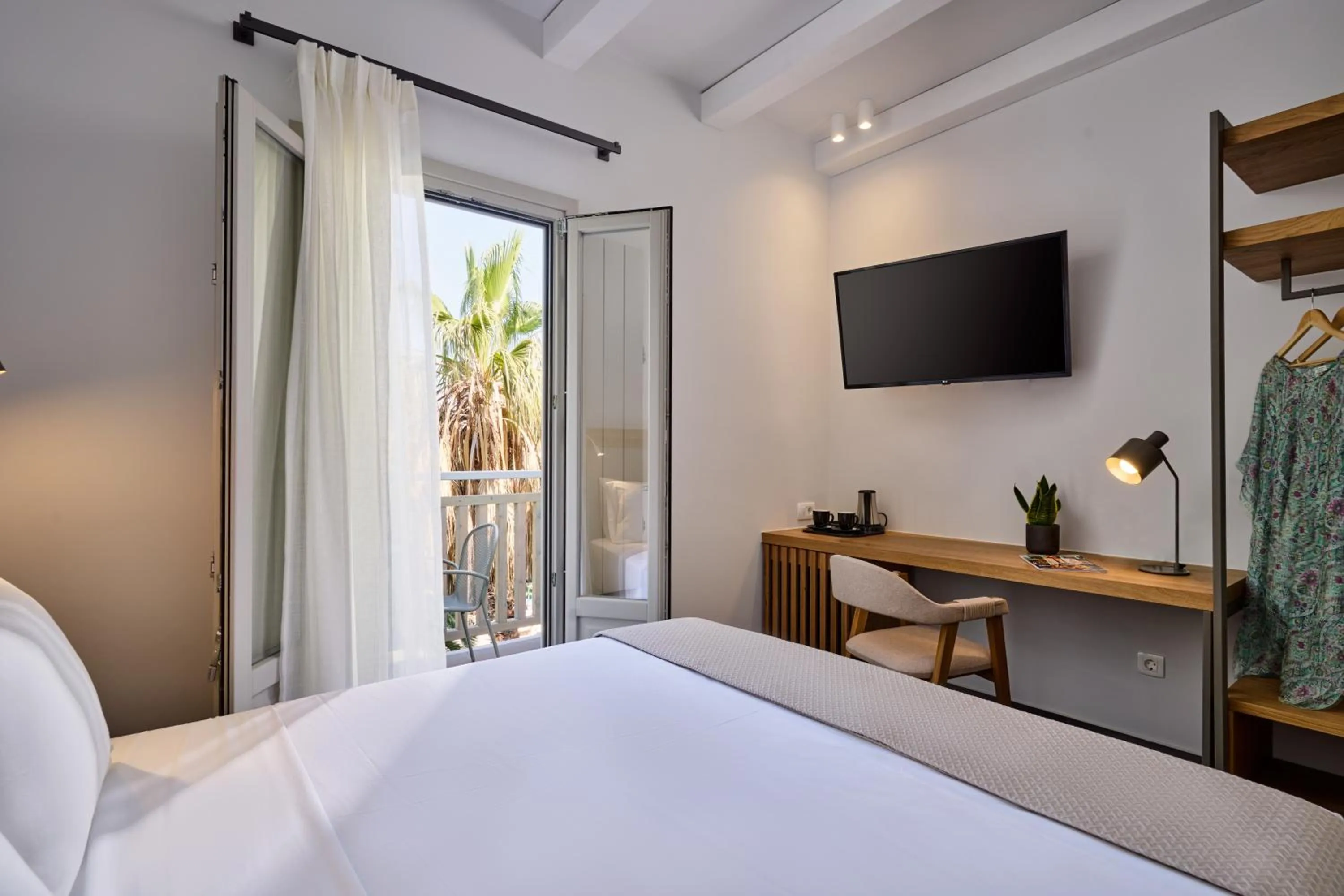 TV and multimedia, Bed in Meltemi Village Hotel