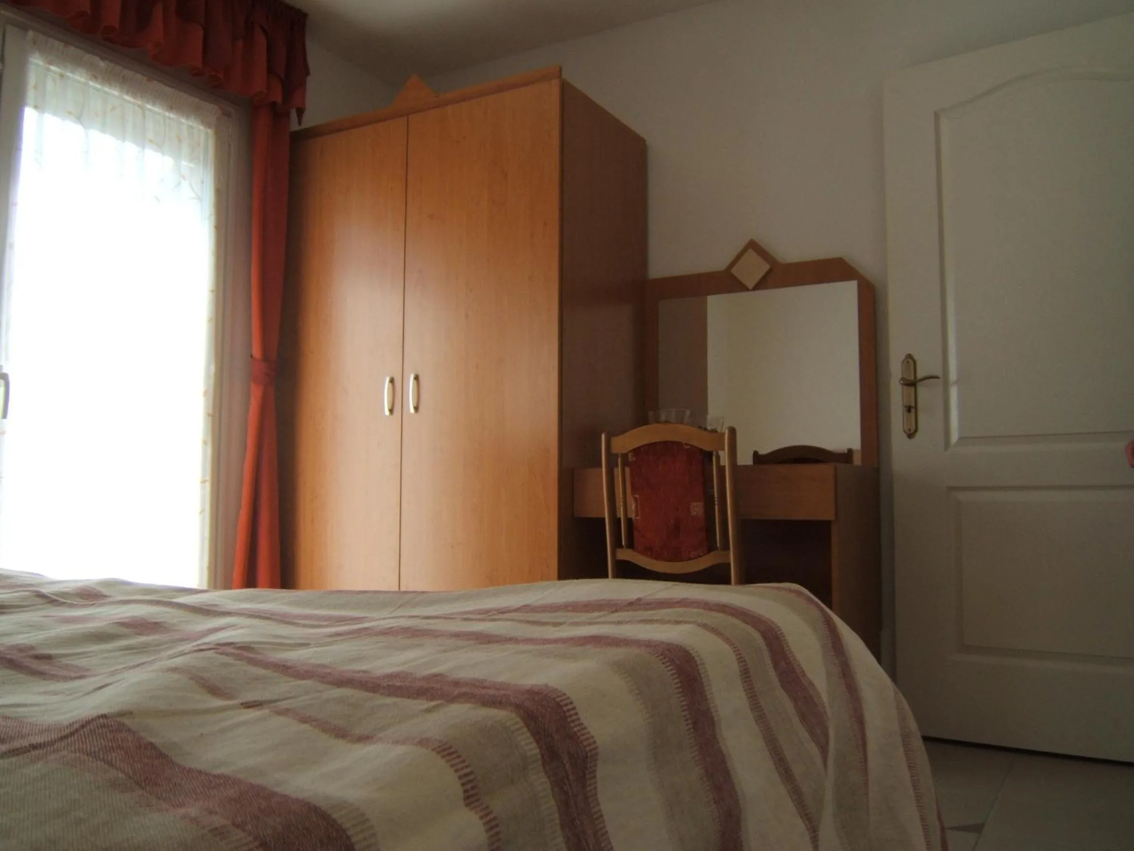Bed in Andrea Apartmanok