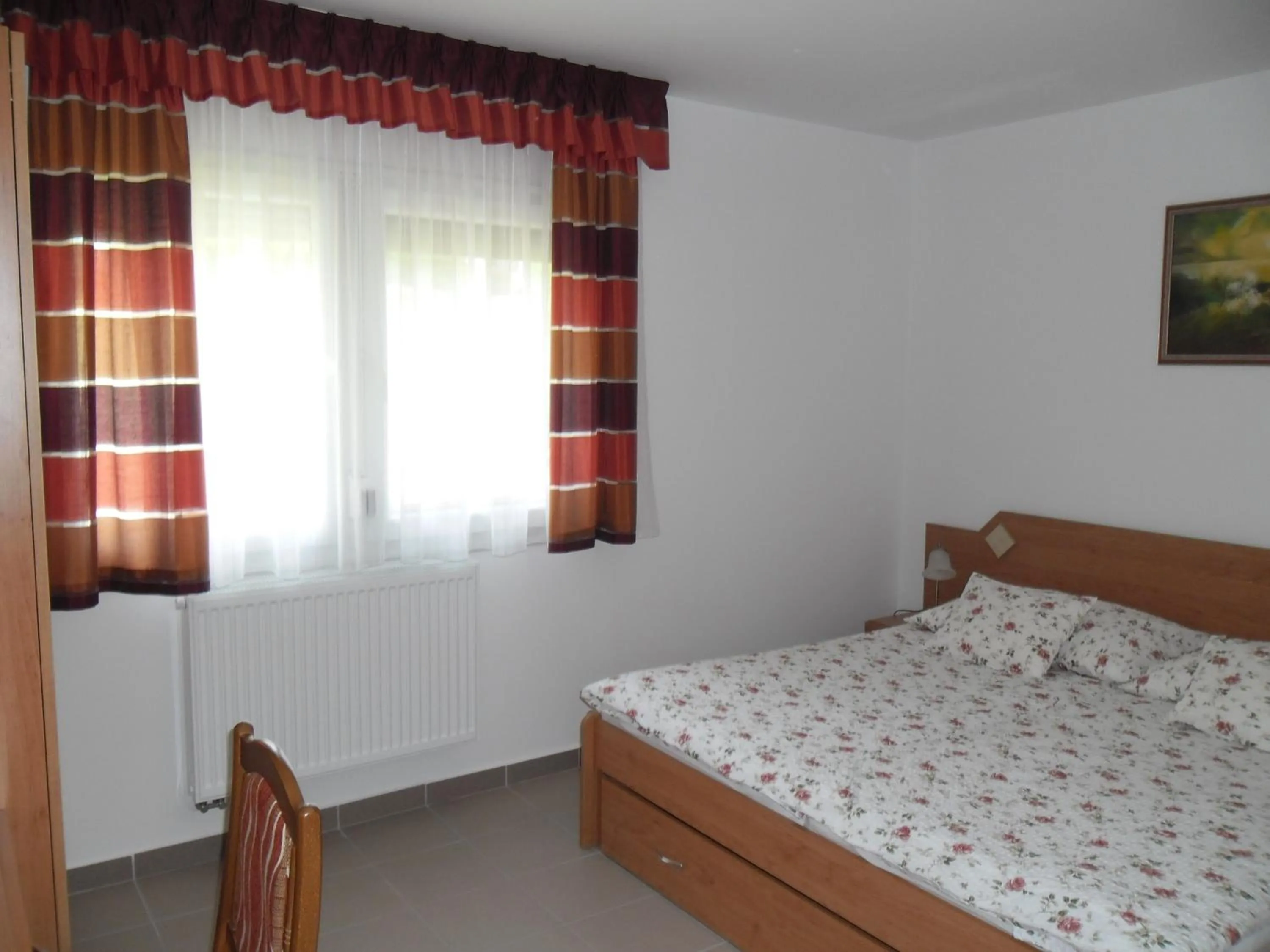 Bed in Andrea Apartmanok