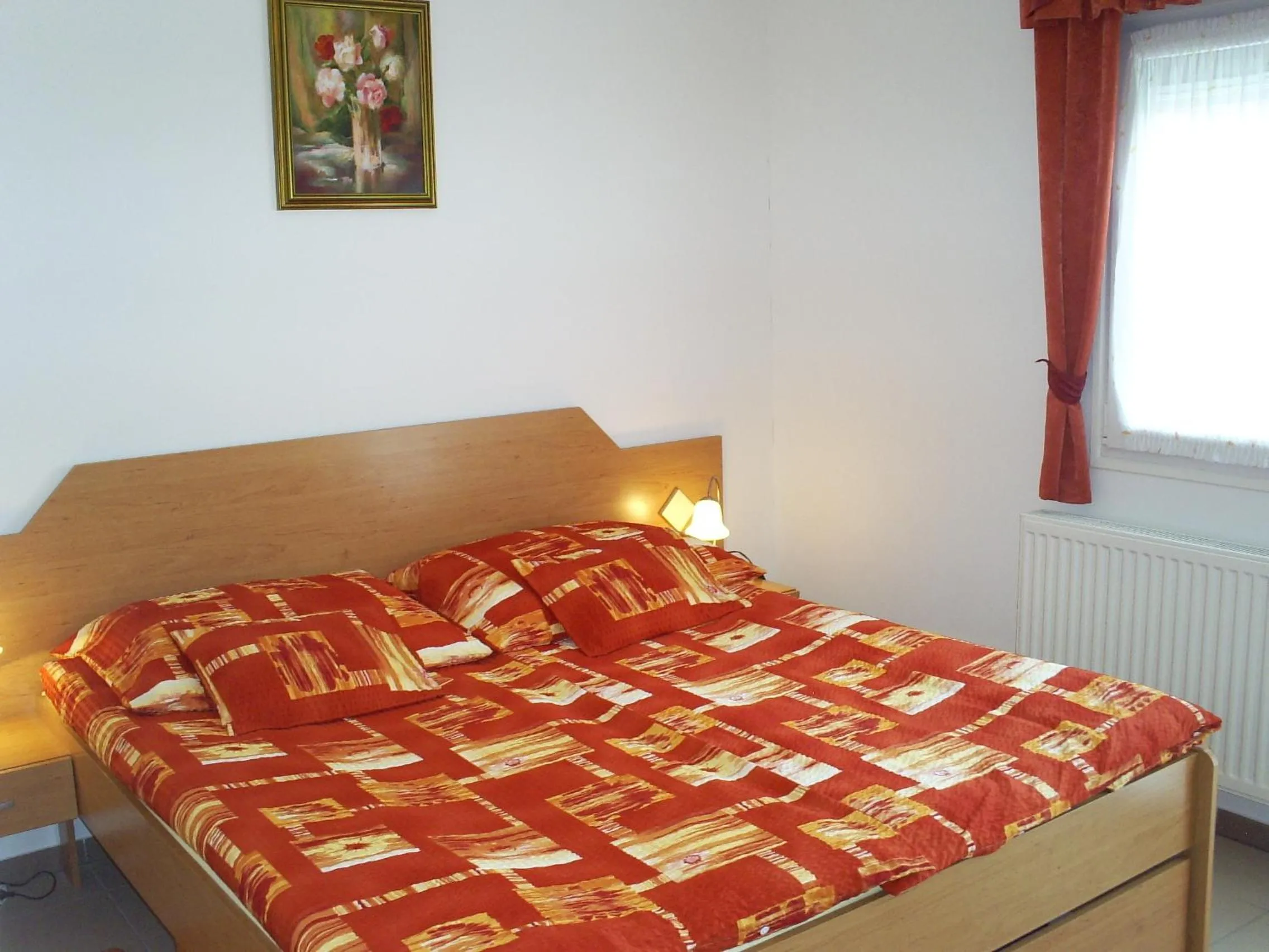 Bed in Andrea Apartmanok