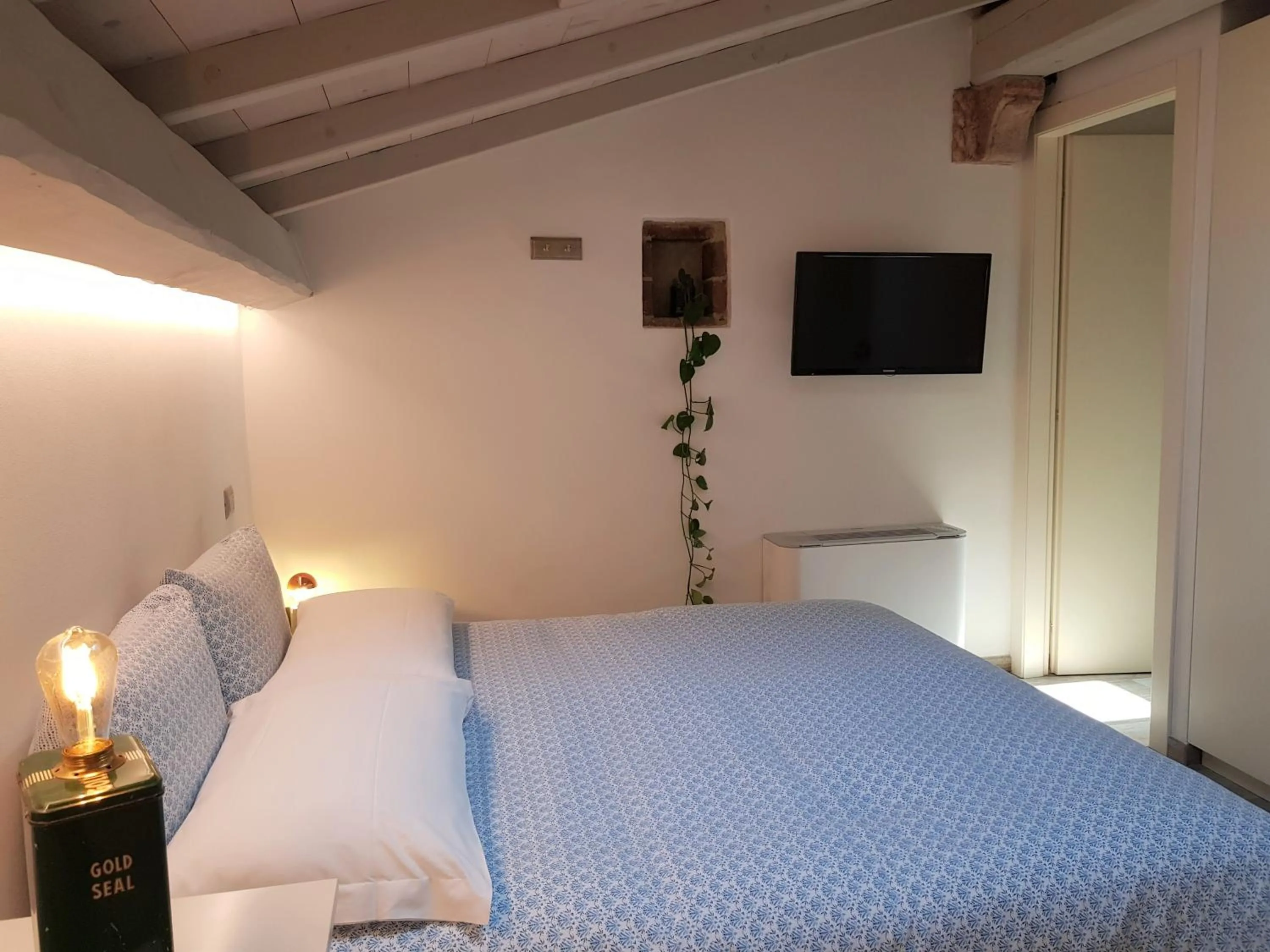 Bed in Santa Marta Rooms&Studios