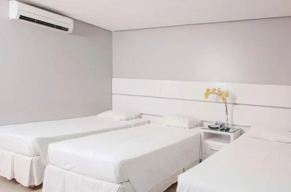 Bed in Brisa Tower Hotel