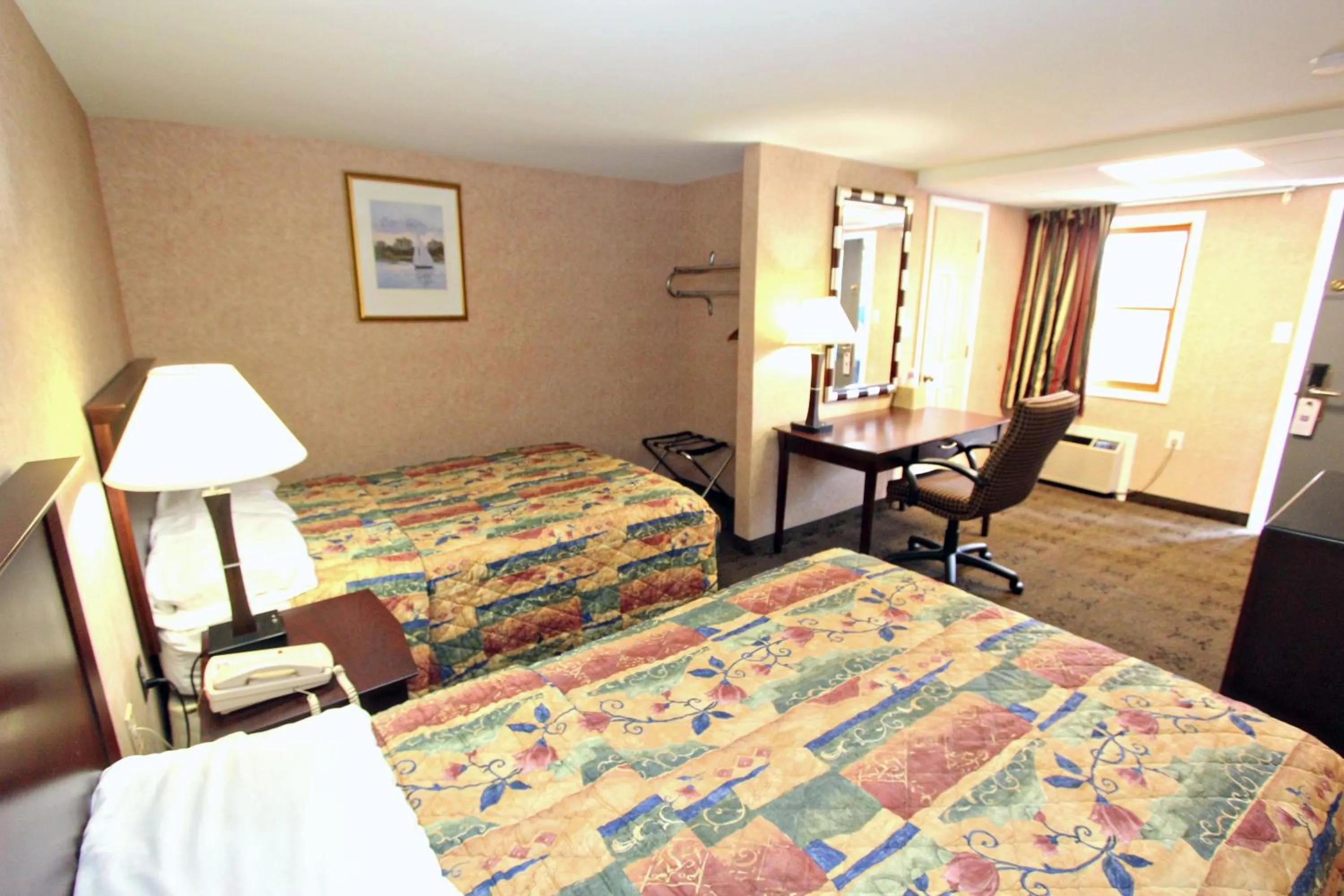 Bed in Knights Inn Pine Grove