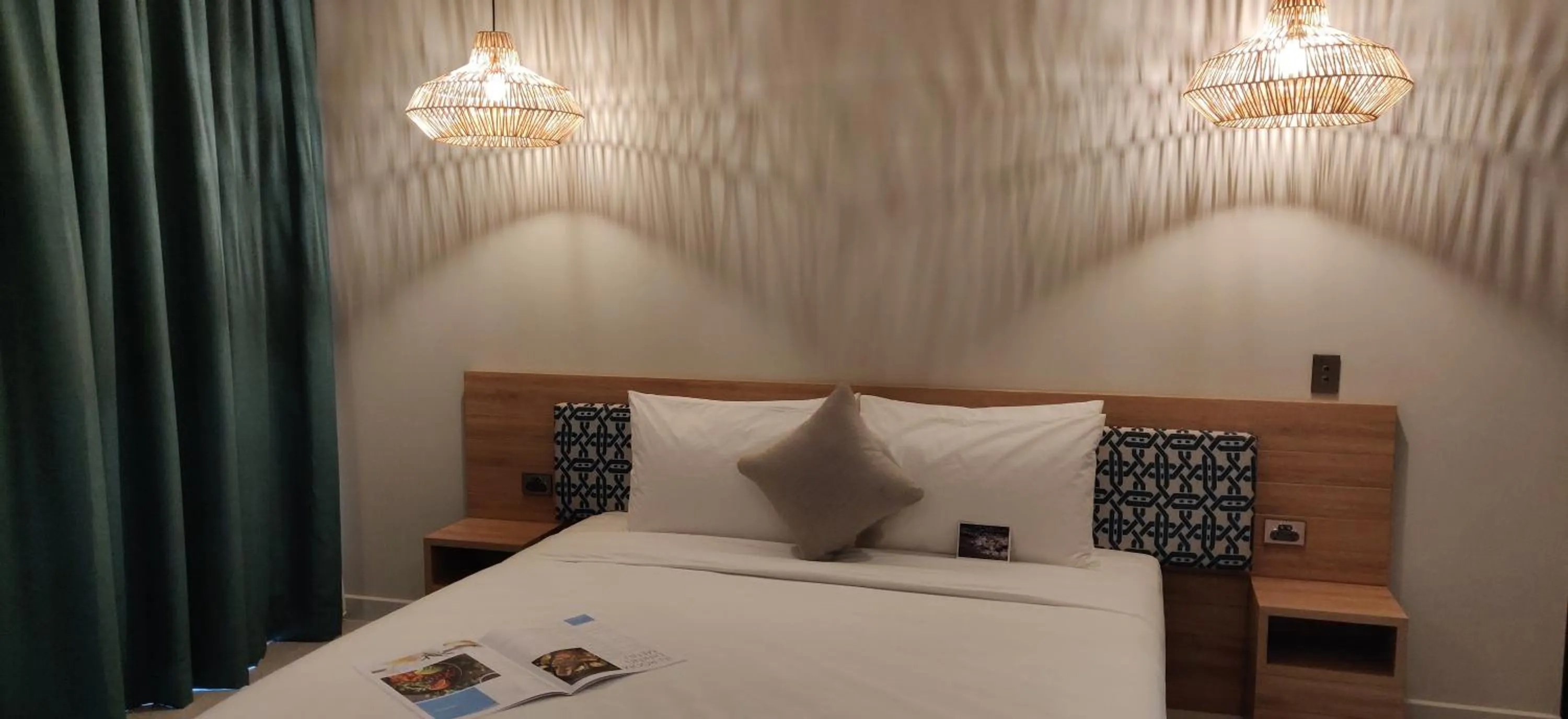 Bed in Loloata Island Resort