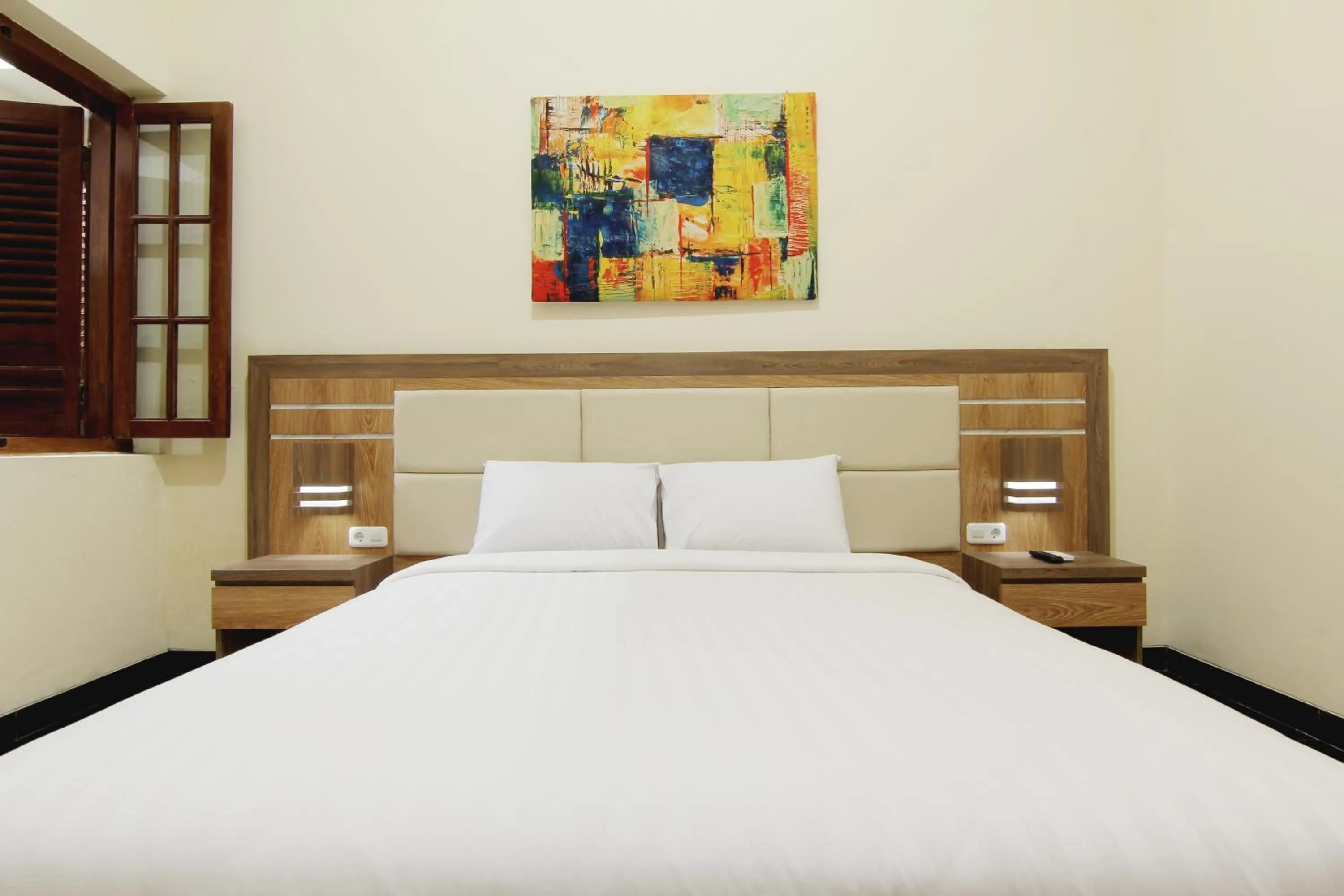 Bed in Musafir Guest House Syariah