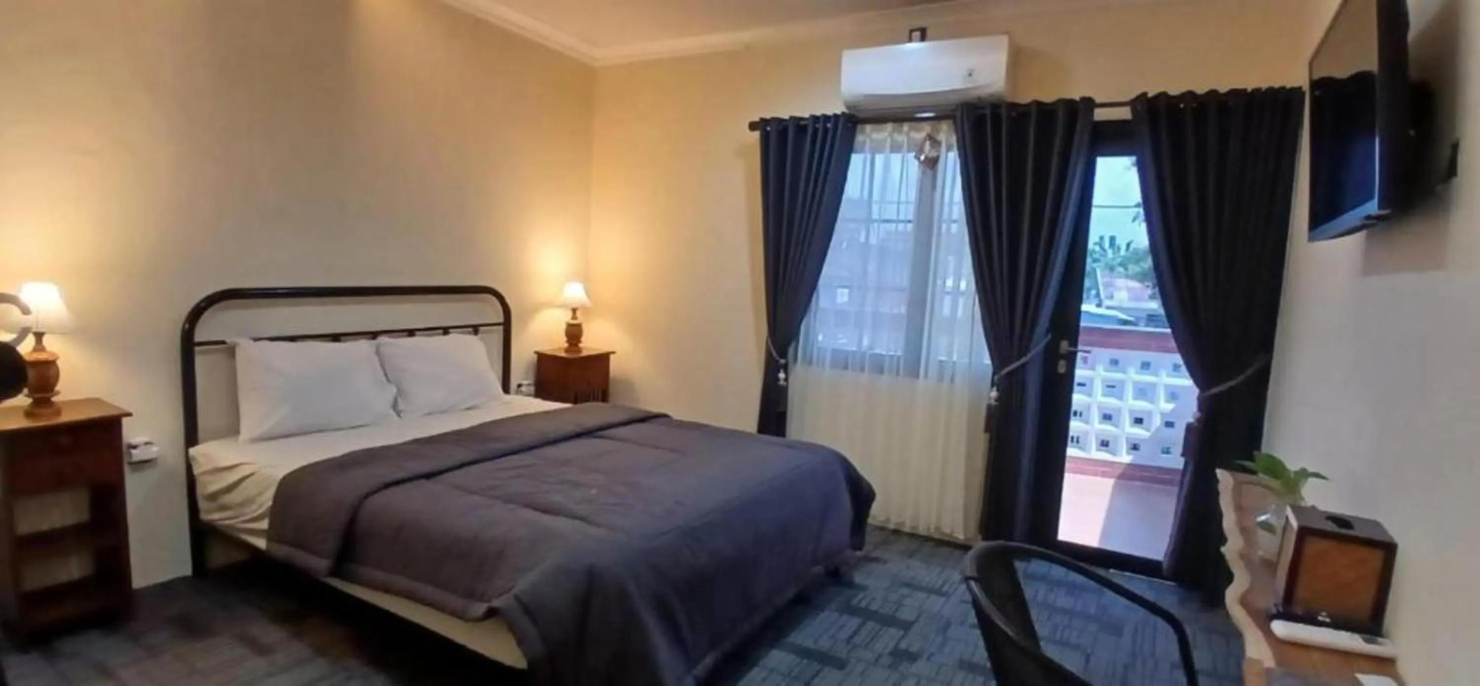 Bed in Musafir Guest House Syariah