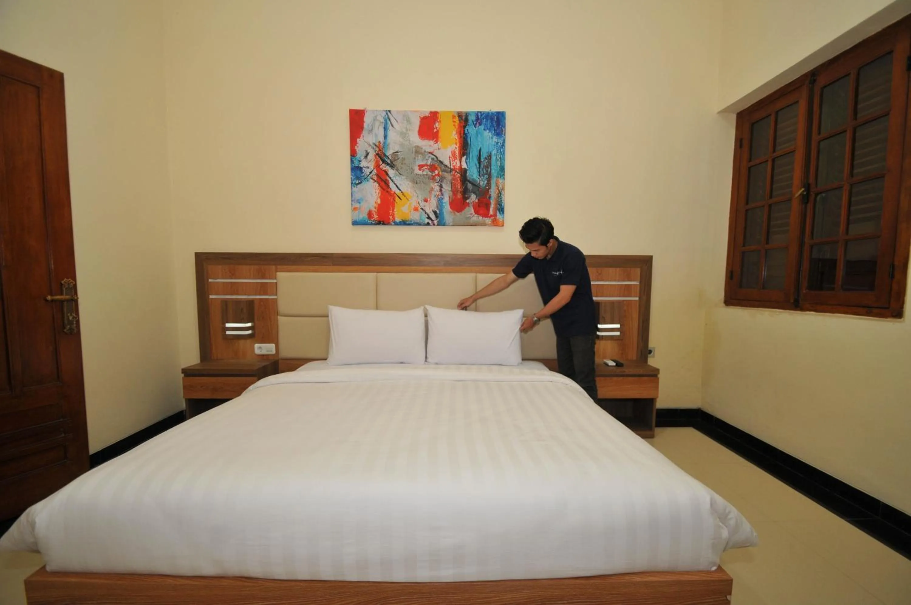 Bed in Musafir Guest House Syariah