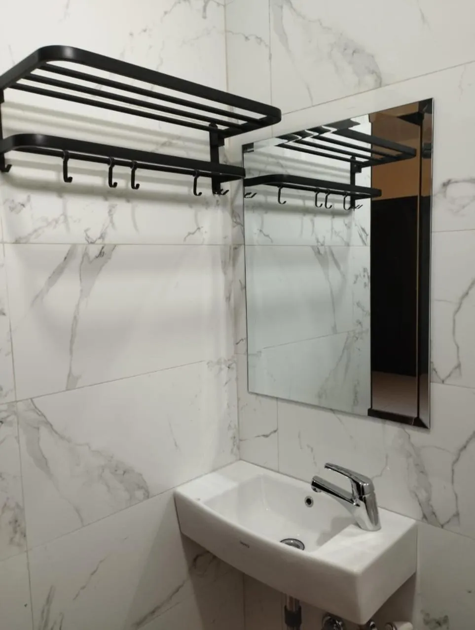 Bathroom in Musafir Guest House Syariah