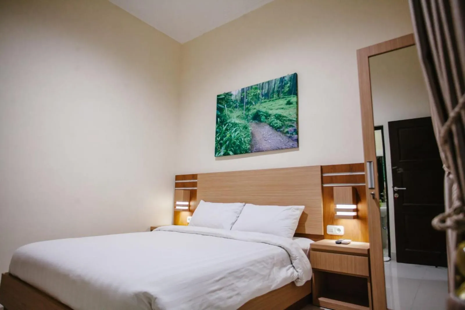 Bed in Musafir Guest House Syariah