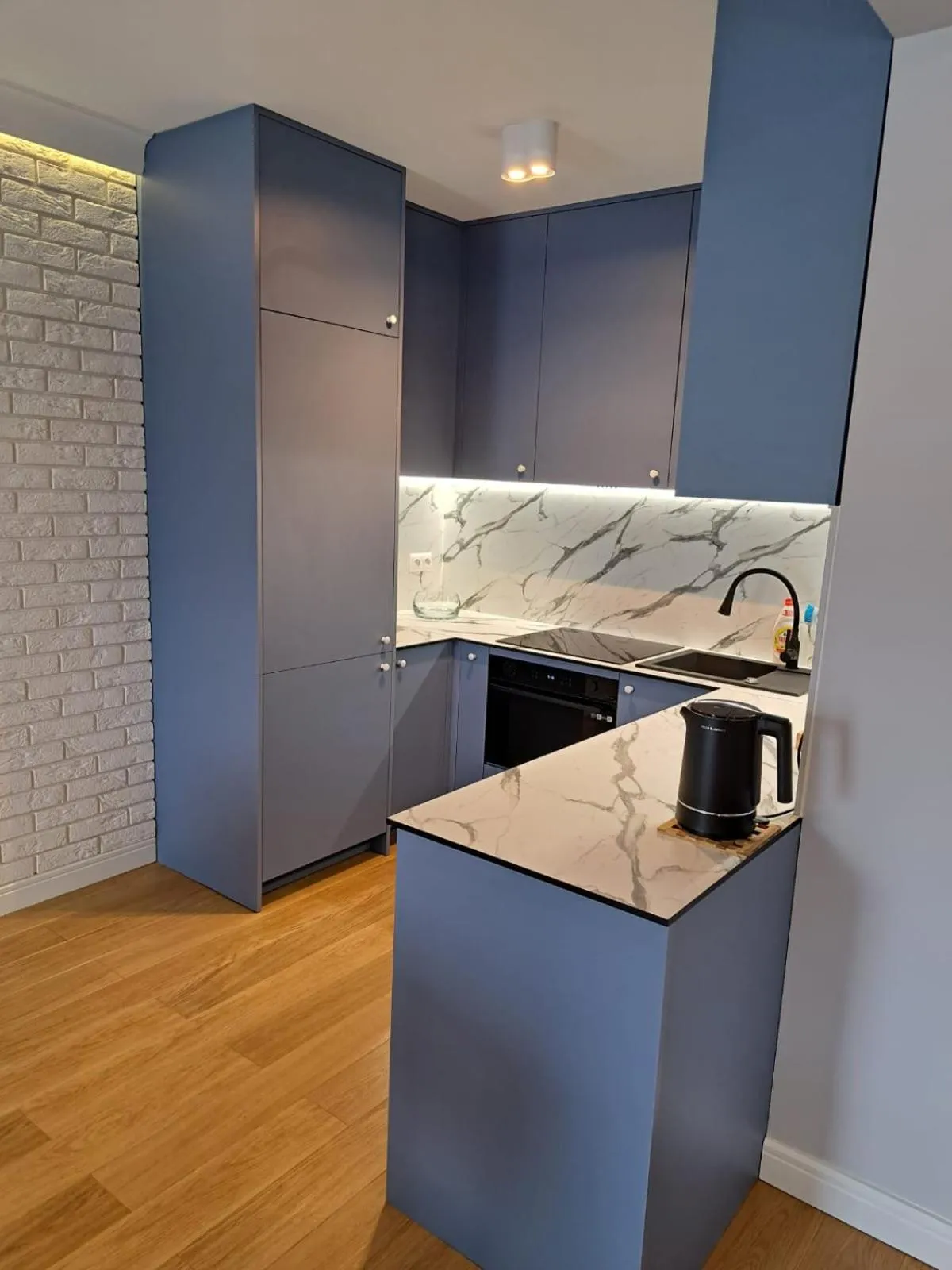 Kitchen or kitchenette in Pokoje De Luxe Figaro