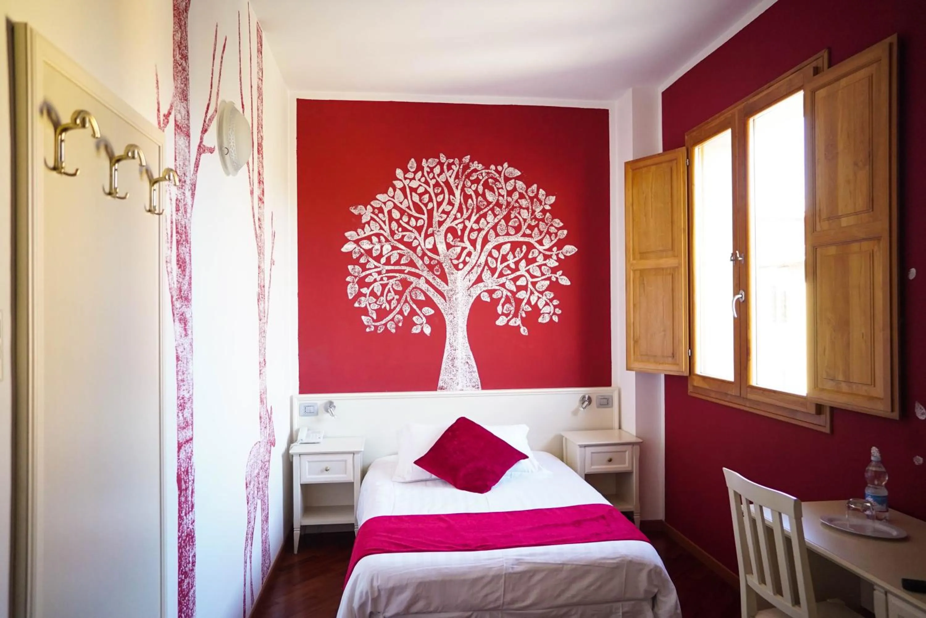 Decorative detail, Bed in Hotel Il Crinale