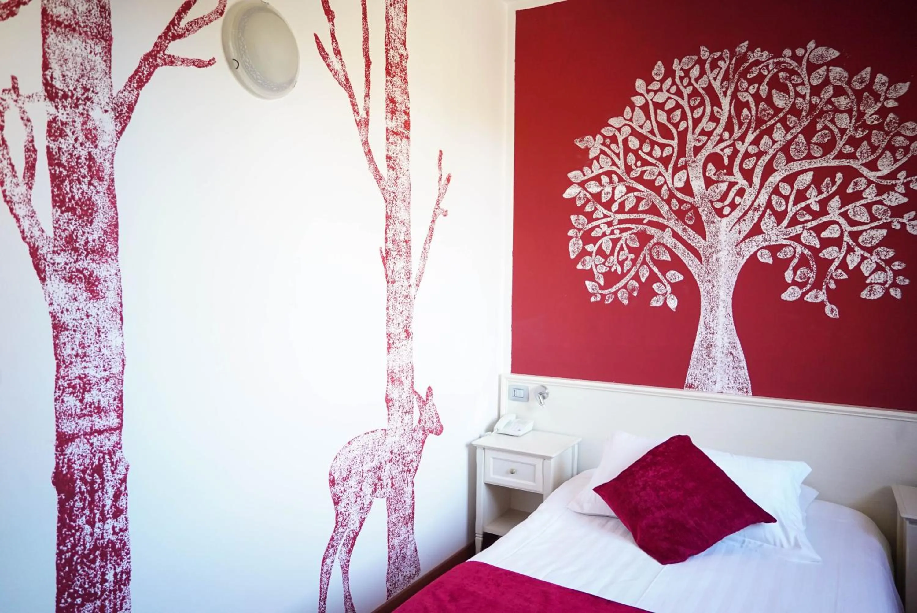 Decorative detail, Bed in Hotel Il Crinale