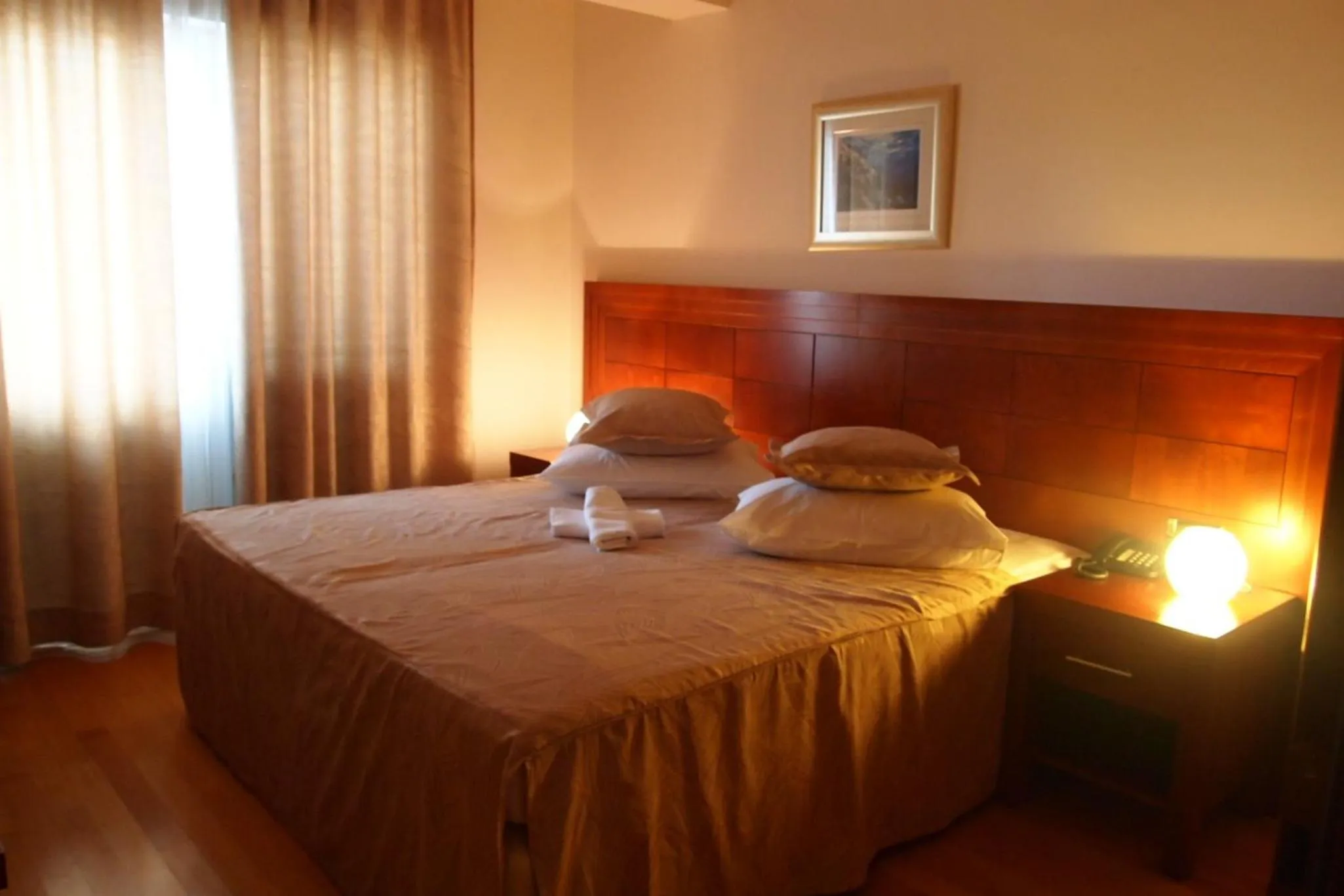 Seating area, Bed in Apartments Agava