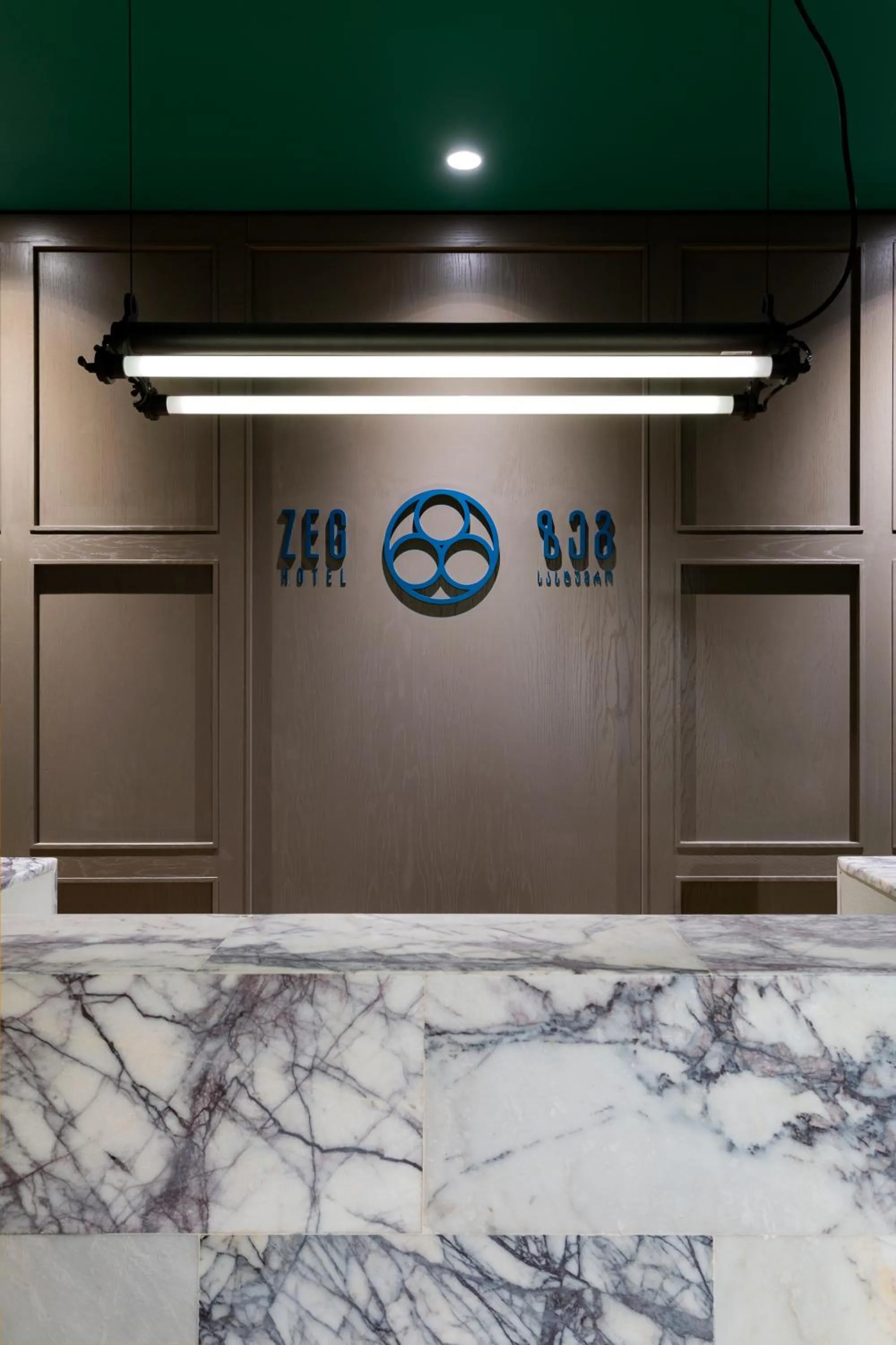 Property logo or sign in Hotel Zeg